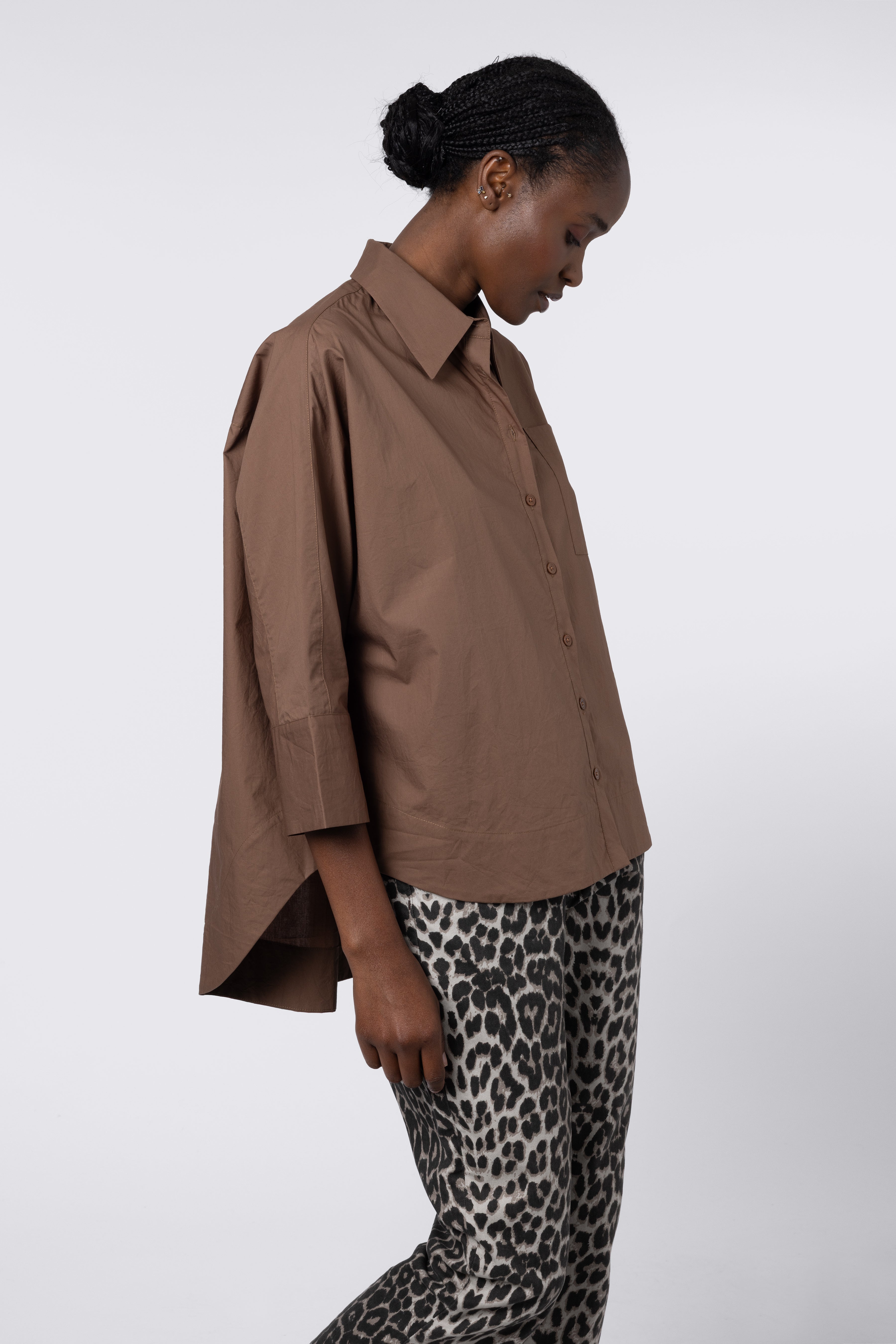 model wearing white cotton shirt