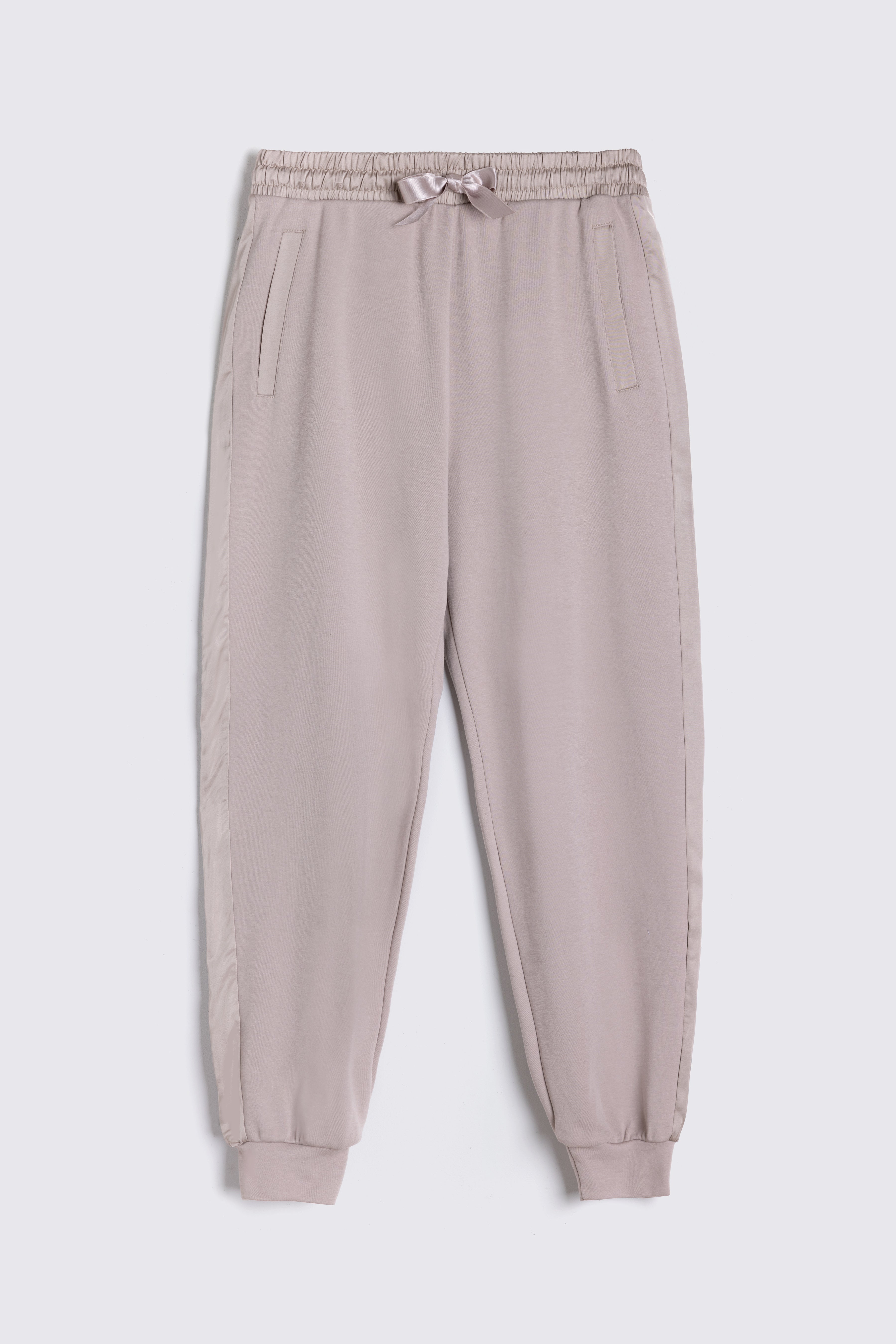 Light brown jogger pants on a white background