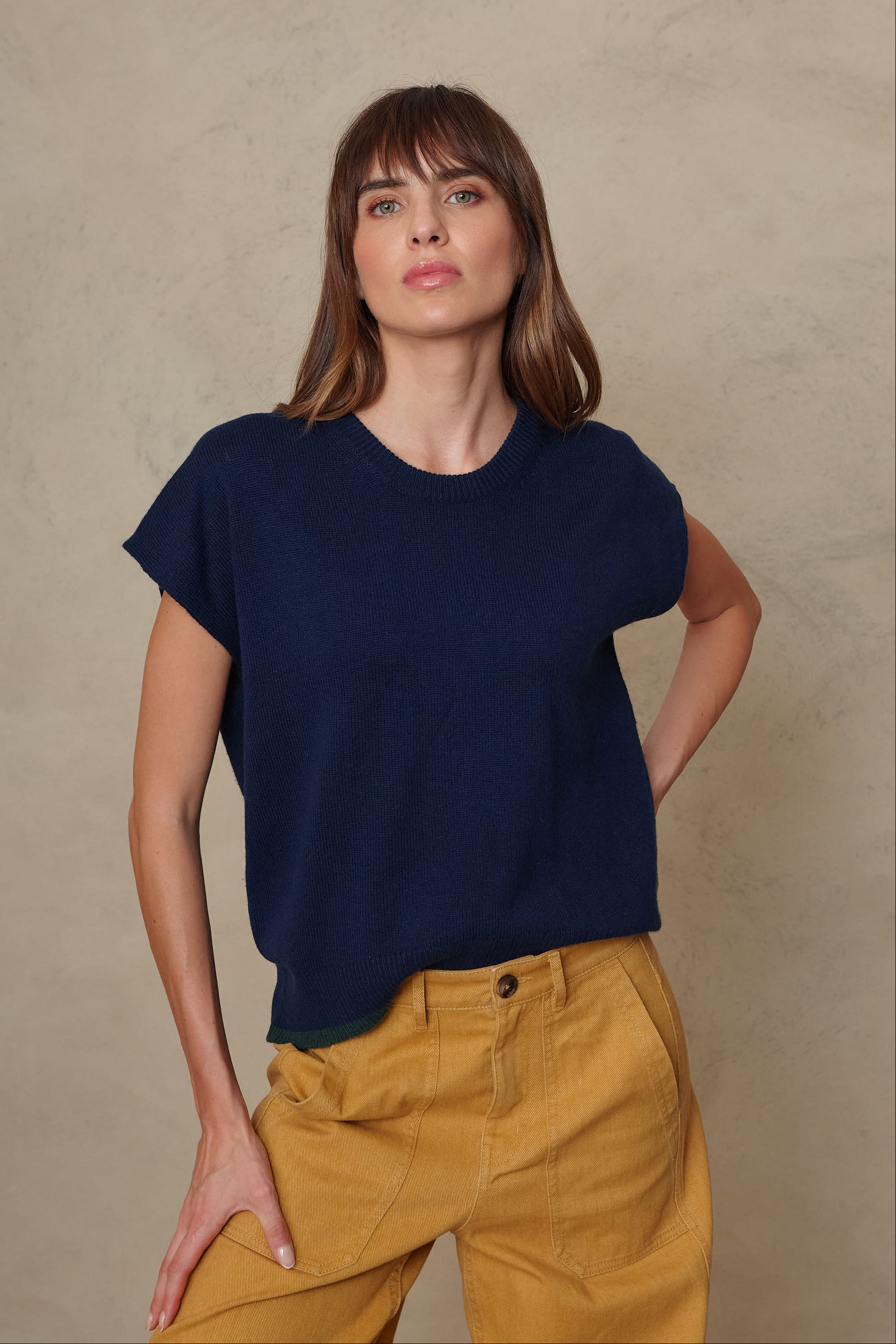 Ora navy knitted vest, a relaxed boxy fit with a gently dropped back hem