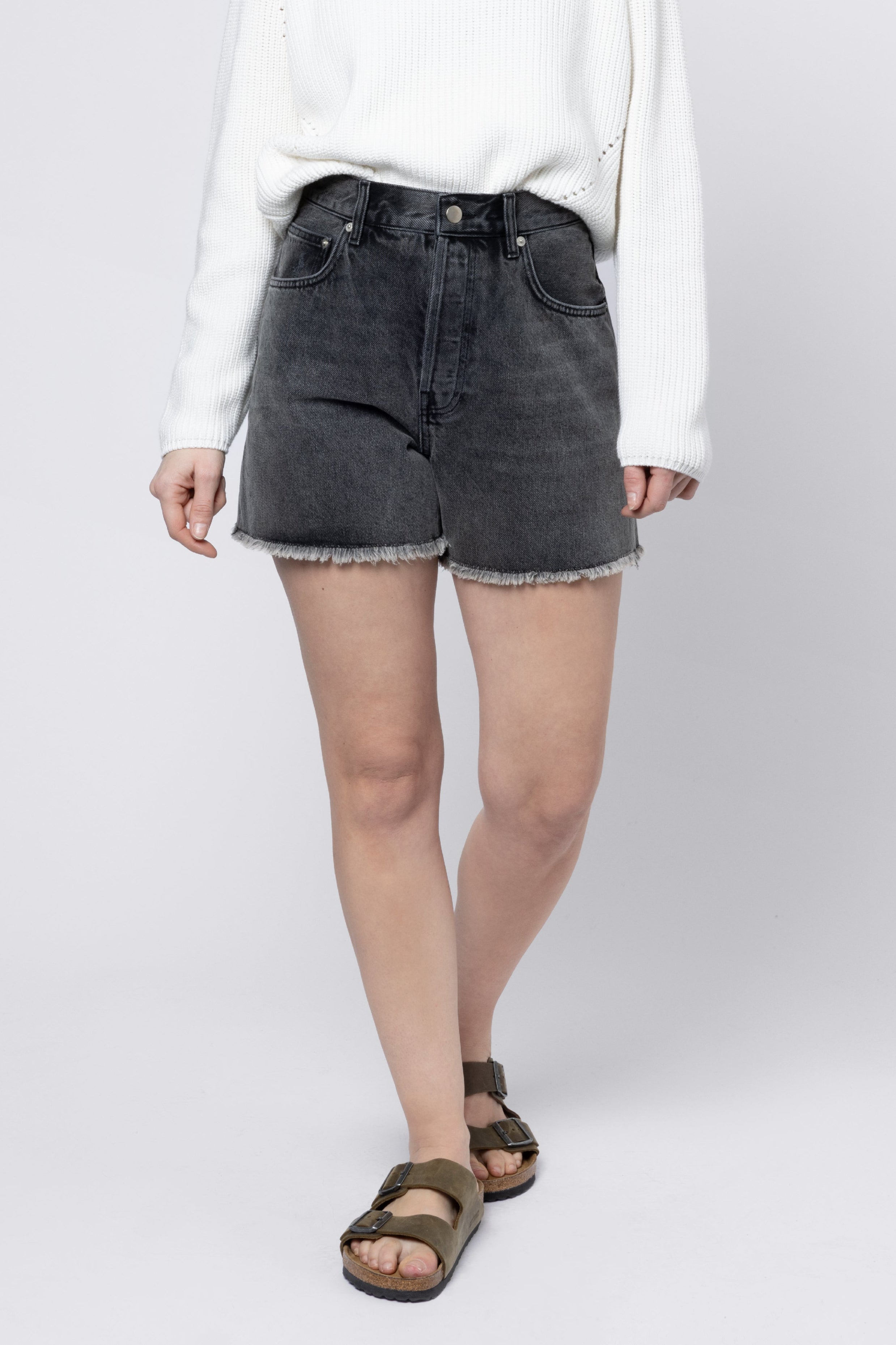 model wearing Alice Denim Shorts Eleven Loves