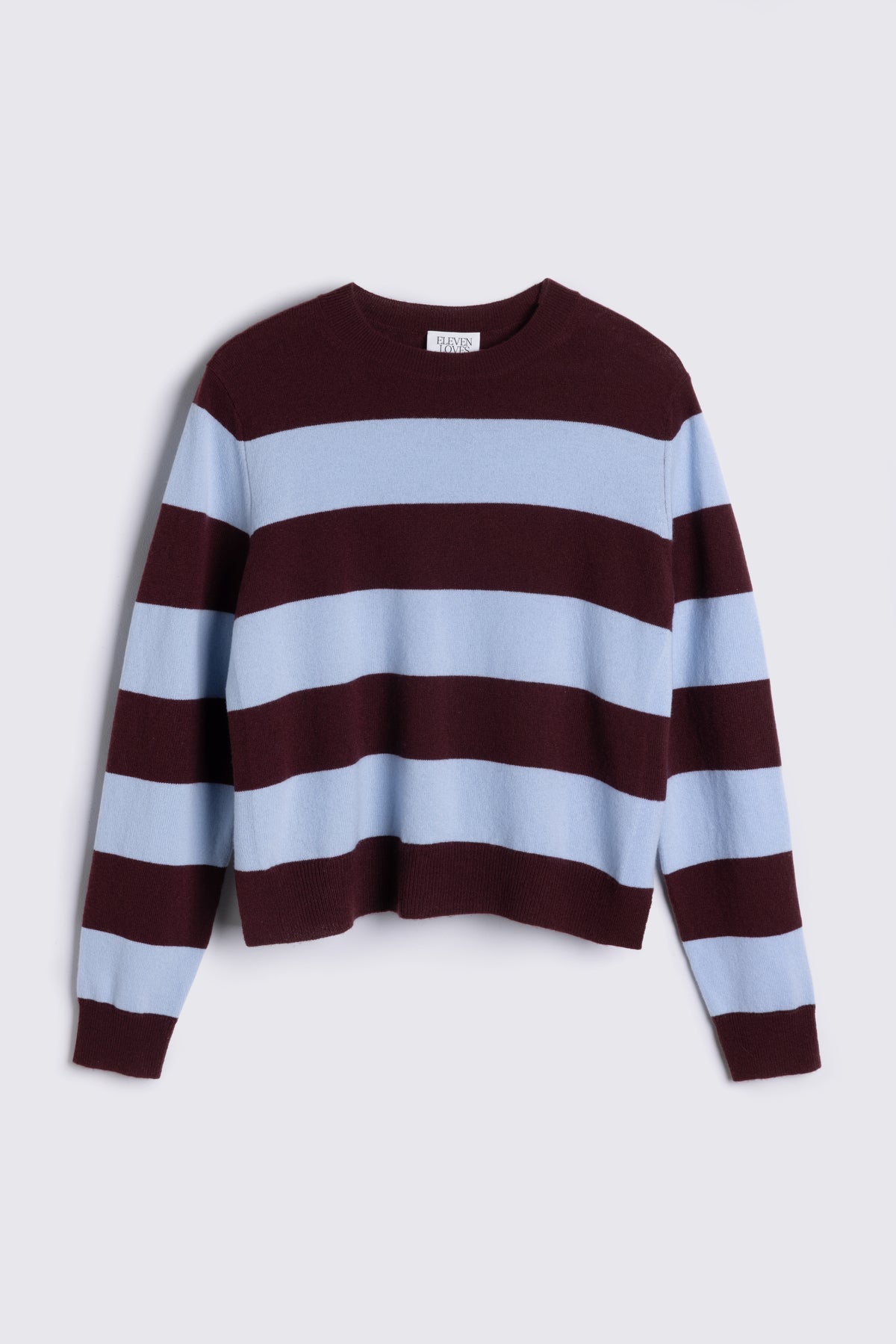 Camille wool and cashmere striped jumper in sky blue and burgundy on a plain background