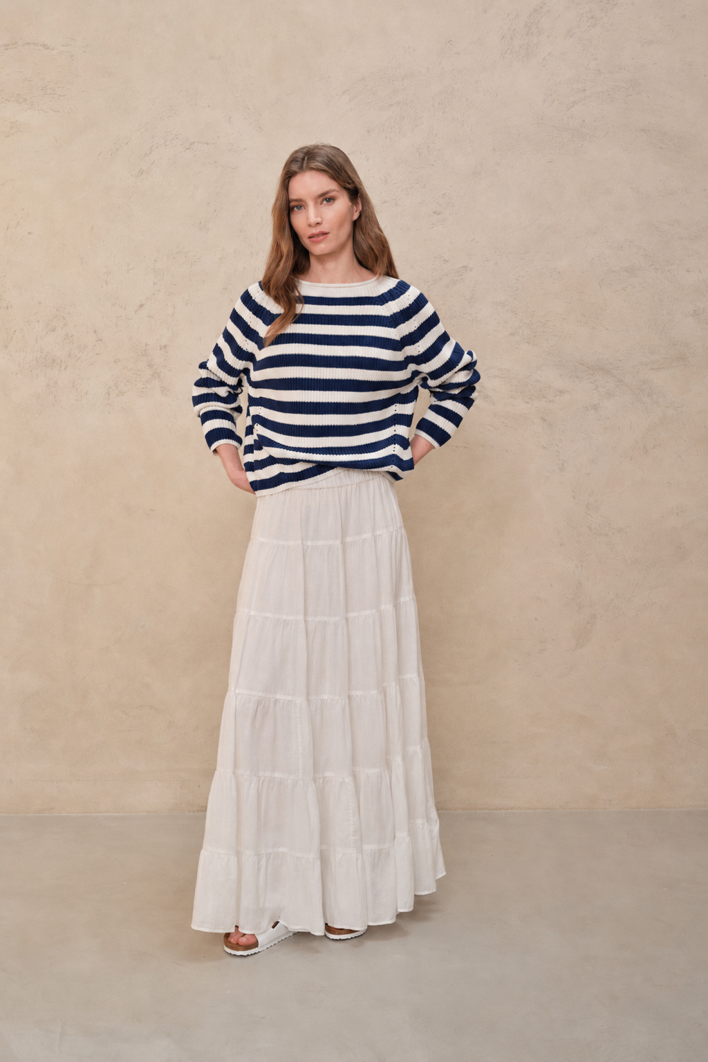 Polly navy striped pointelle jumper with a long white tiered skirt, full length
