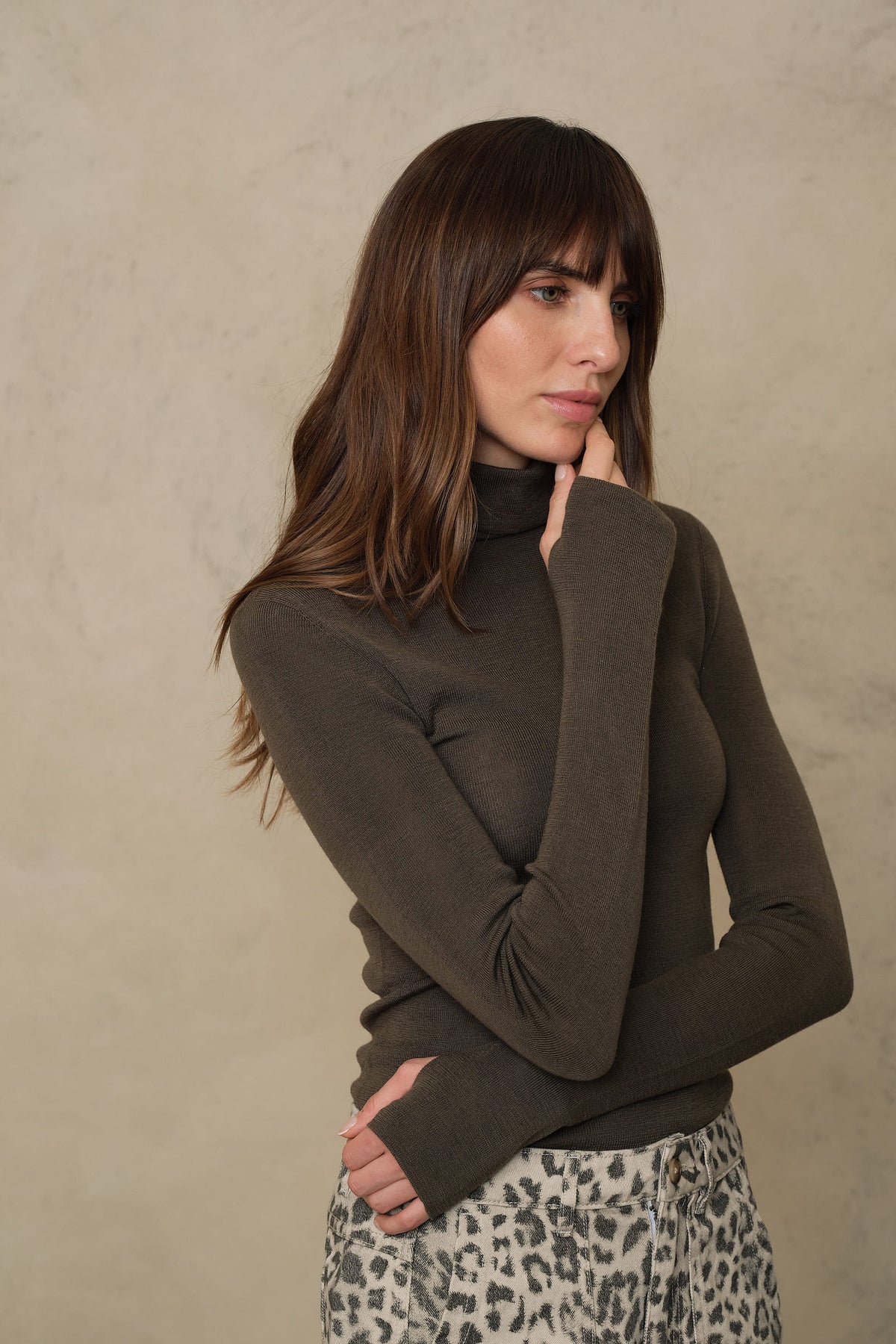Gwyneth fine merino roll neck in dark olive