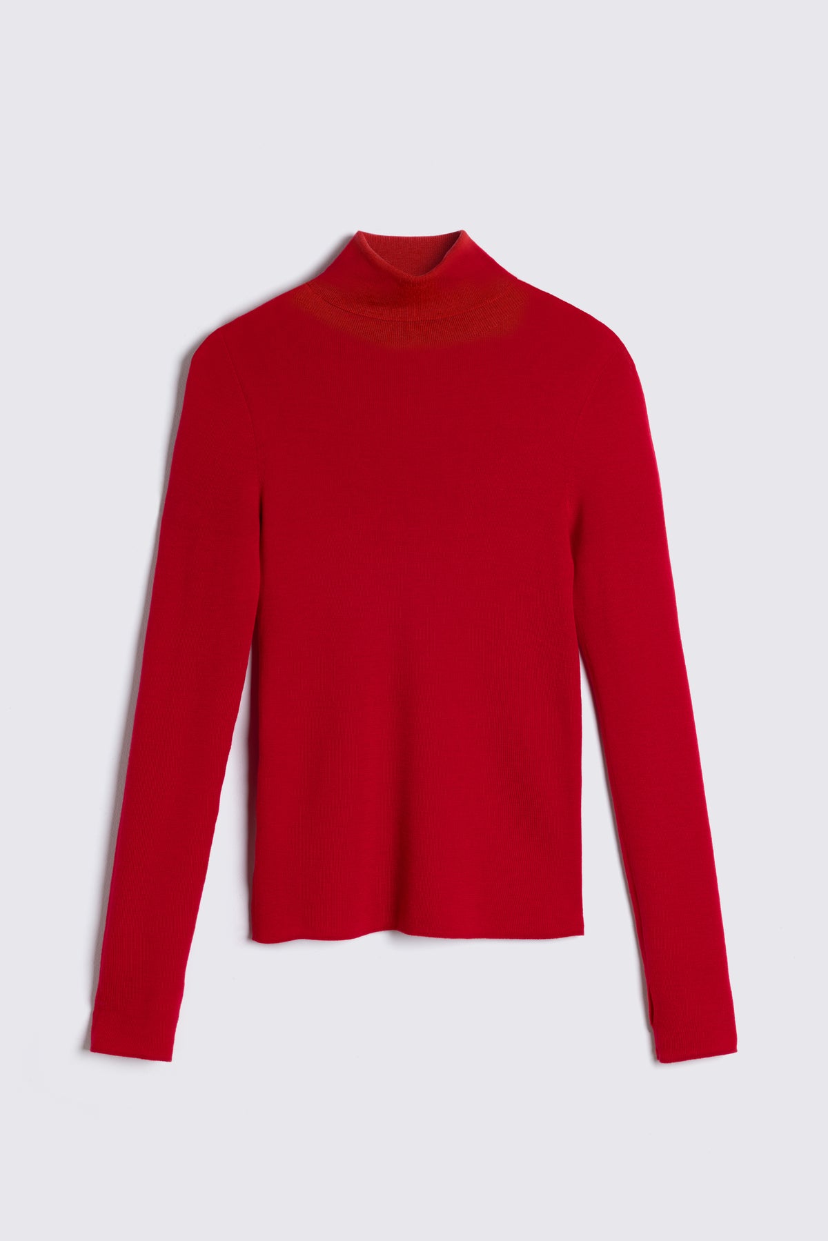 Gwyneth fine merino roll neck in red laid flat on a plain background