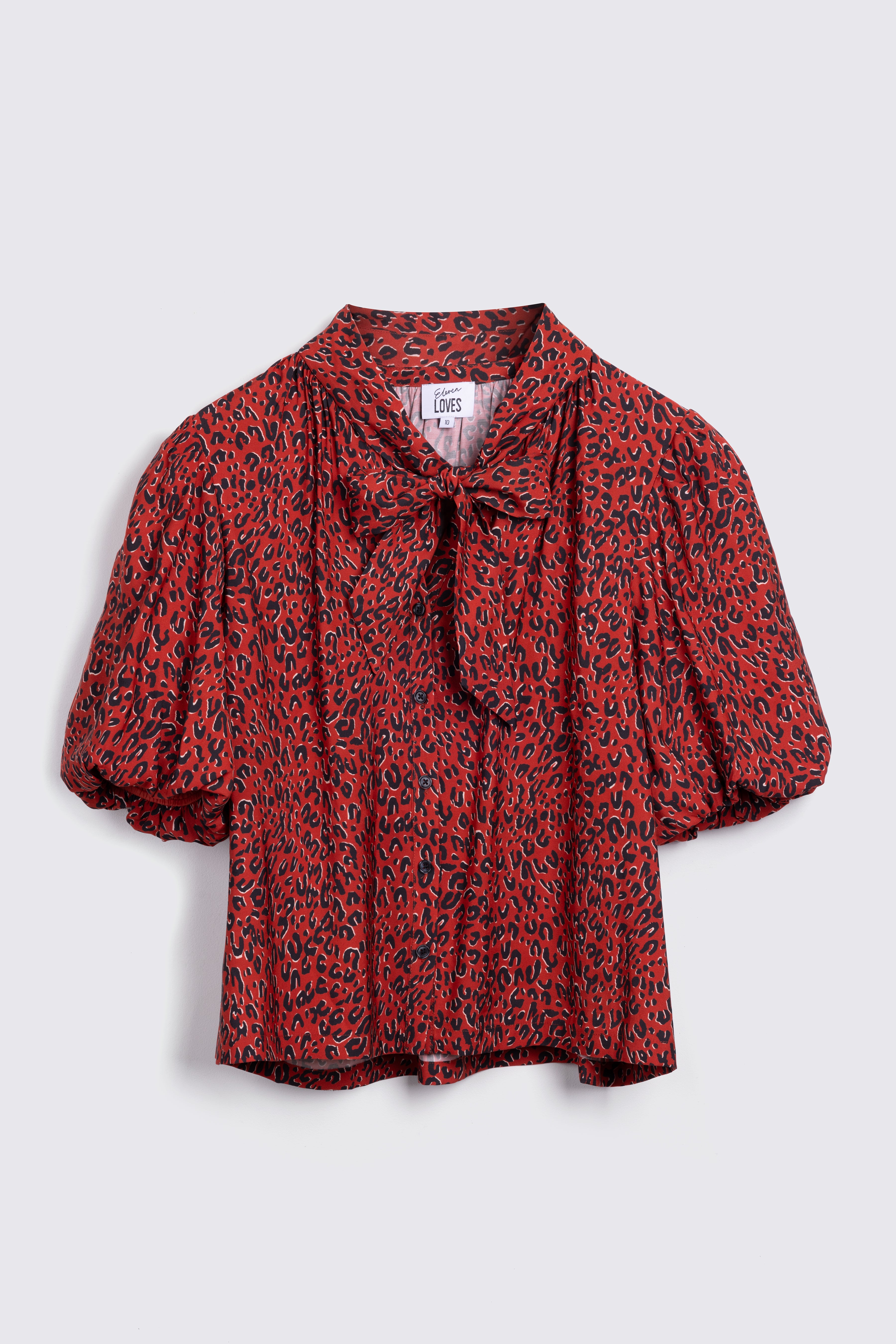 Red Animal Print Blouse on White Background