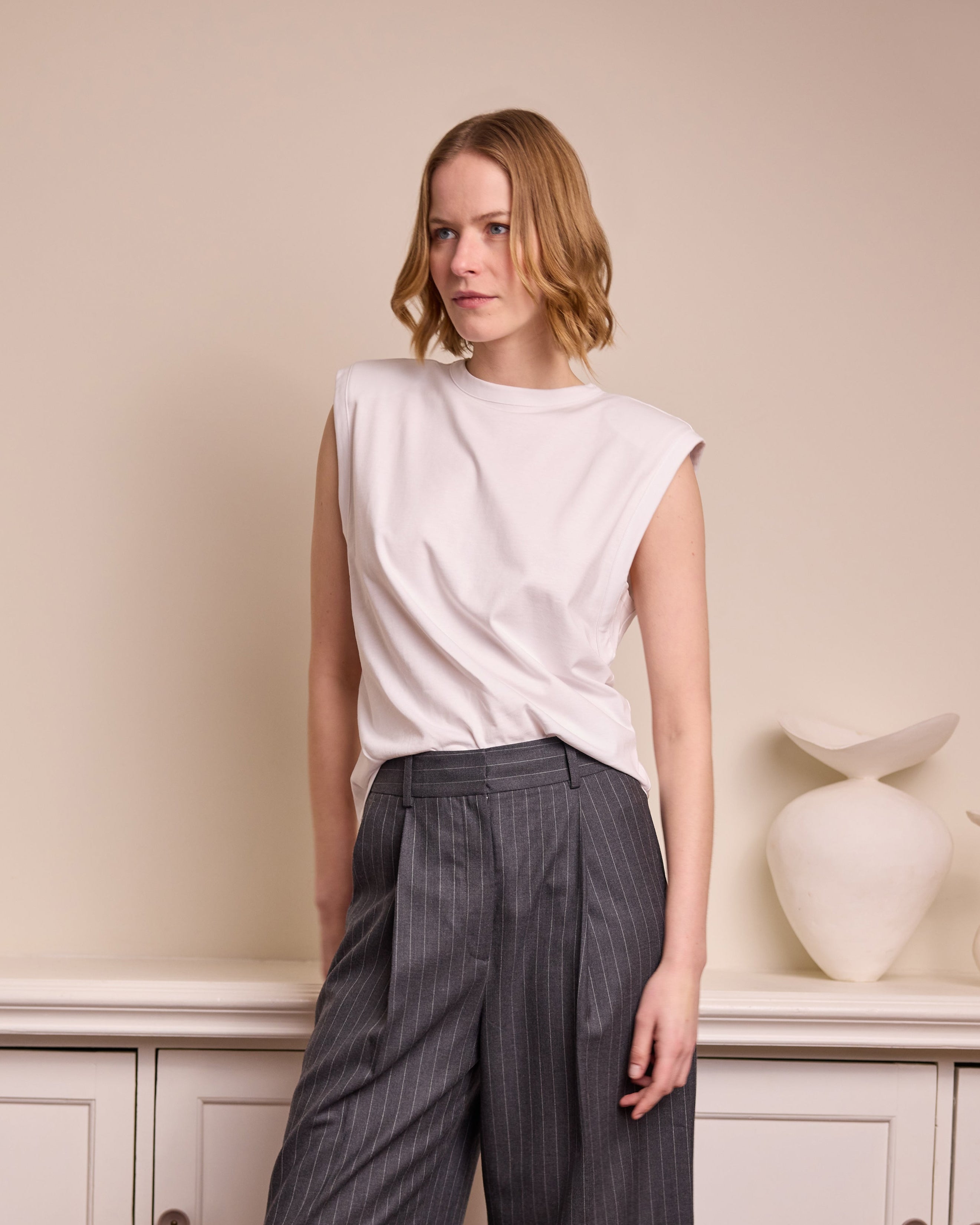 model wearing Leah Pinstripe Trousers Grey Eleven Loves