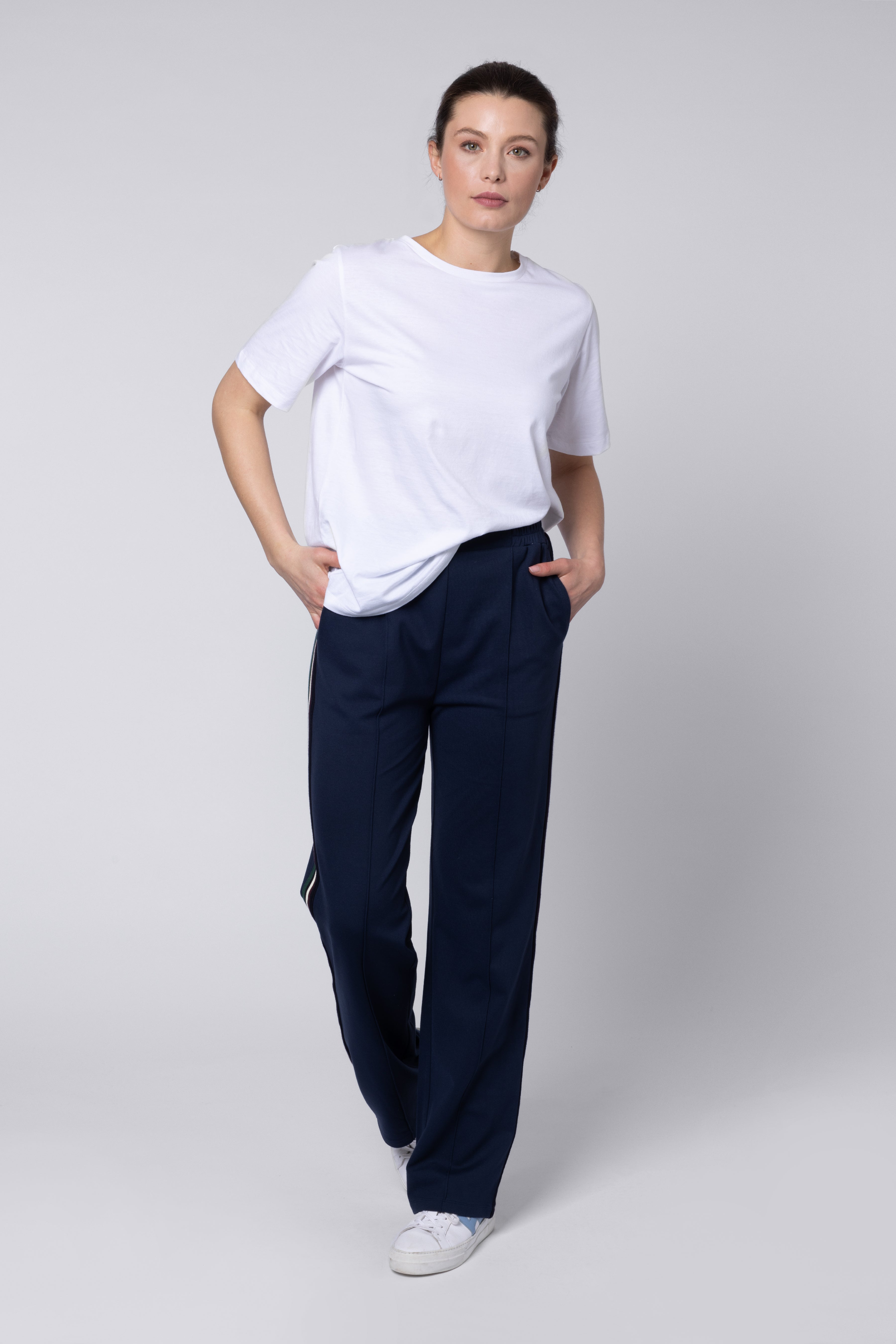Model wearing Navy Side Stripe Trousers Eleven Loves