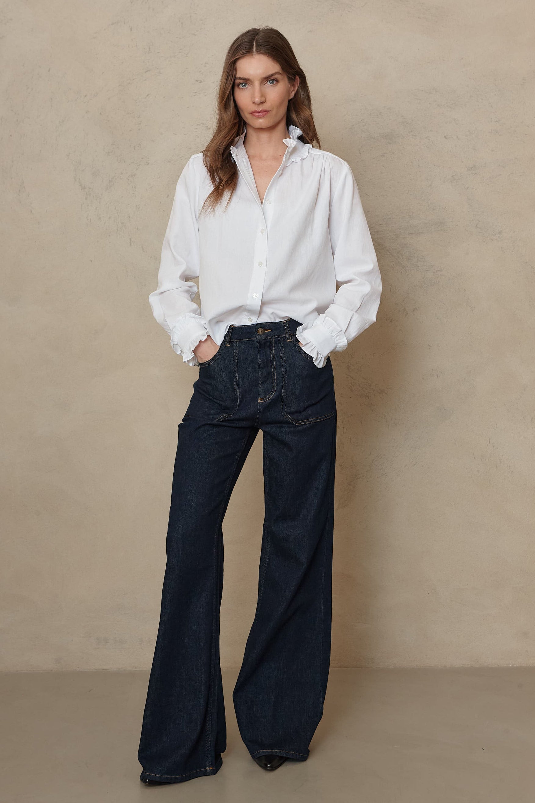 Rinse wash wide leg jeans worn with the Posy ivory ruffle collar shirt for a smarter denim outfit