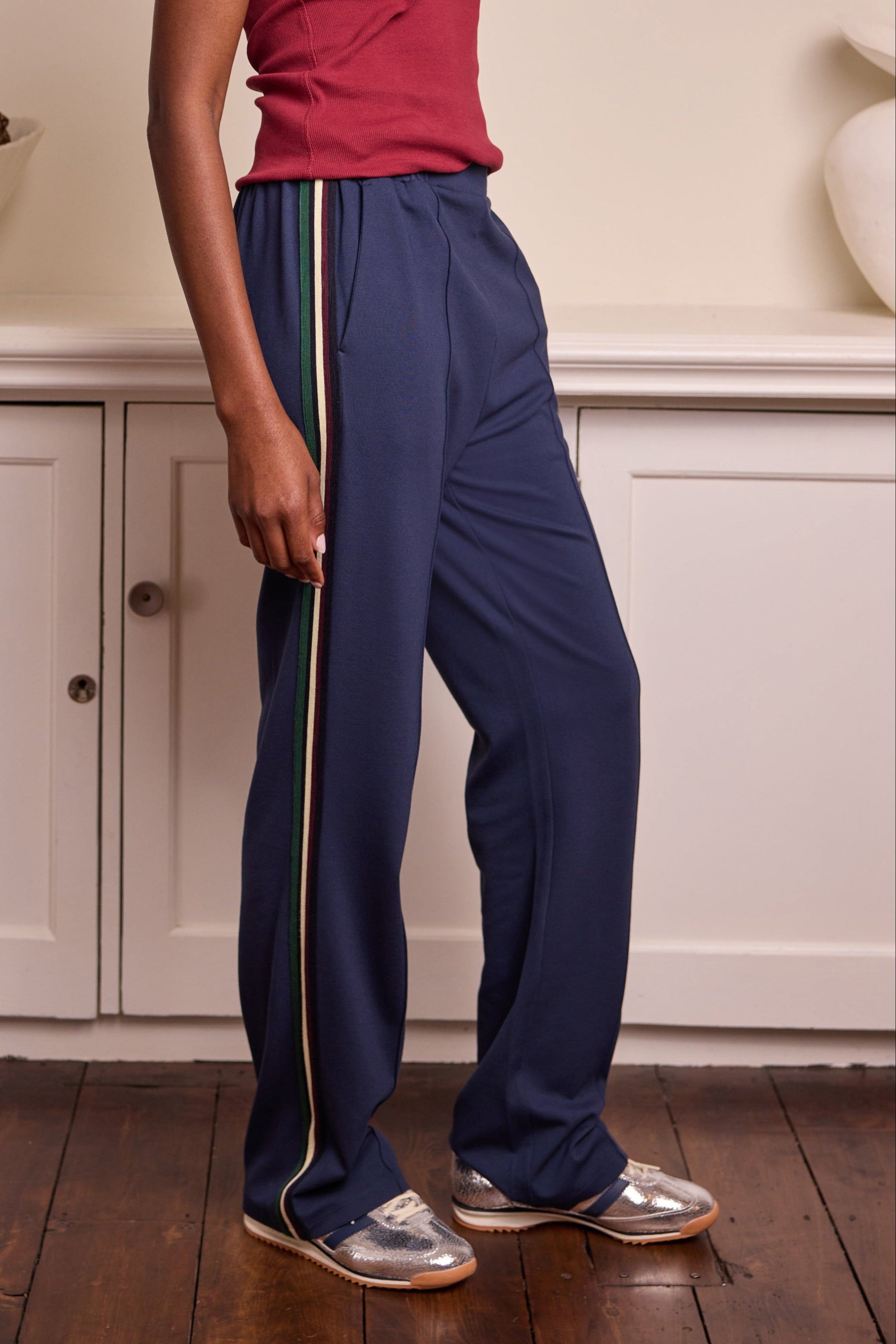 model wearing Saffron Side Stripe Trousers Navy Eleven Loves