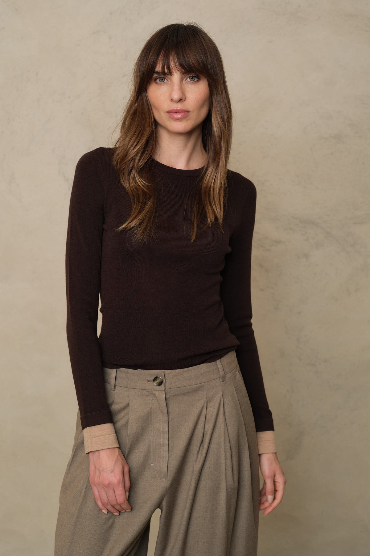 Trinny fine merino crewneck in chocolate with a camel sleeve