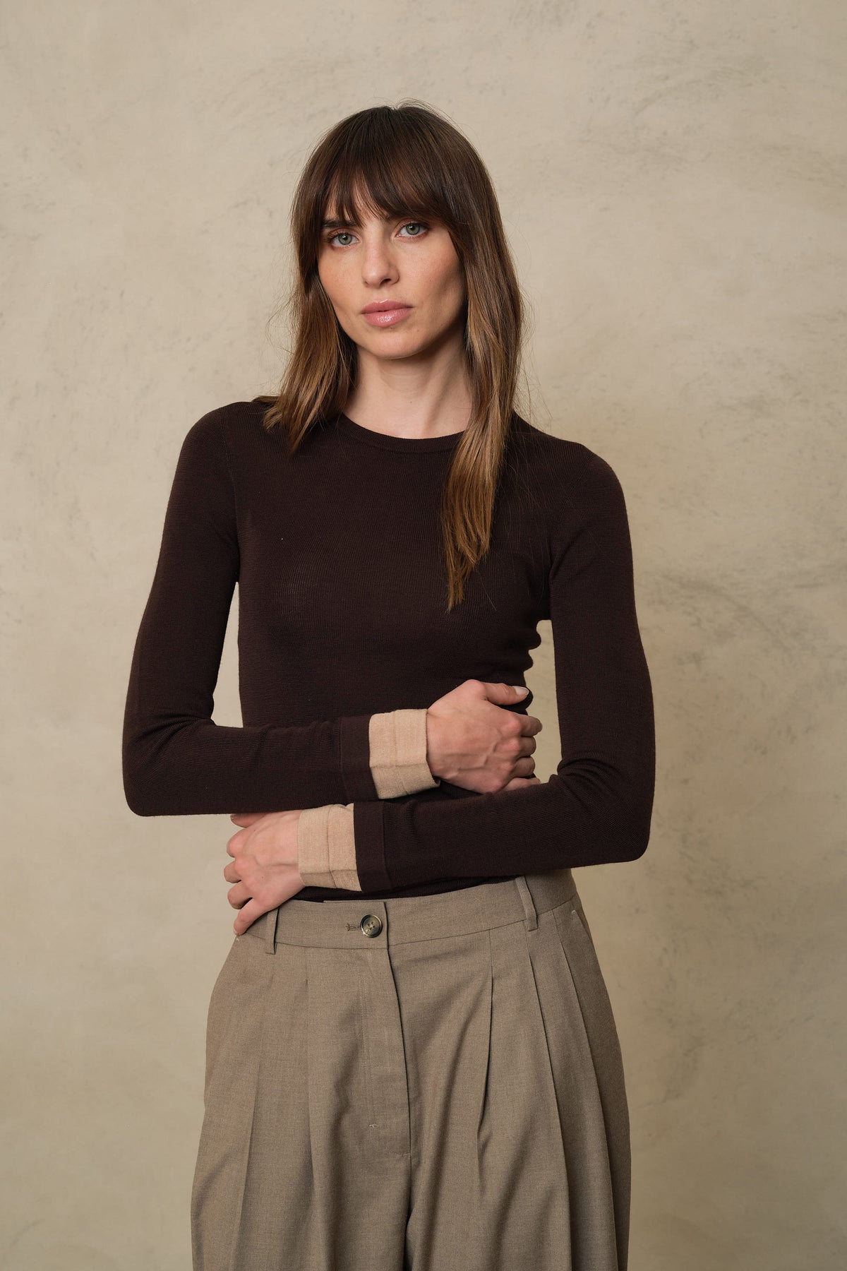 Trinny fine merino crewneck in chocolate with a camel sleeve