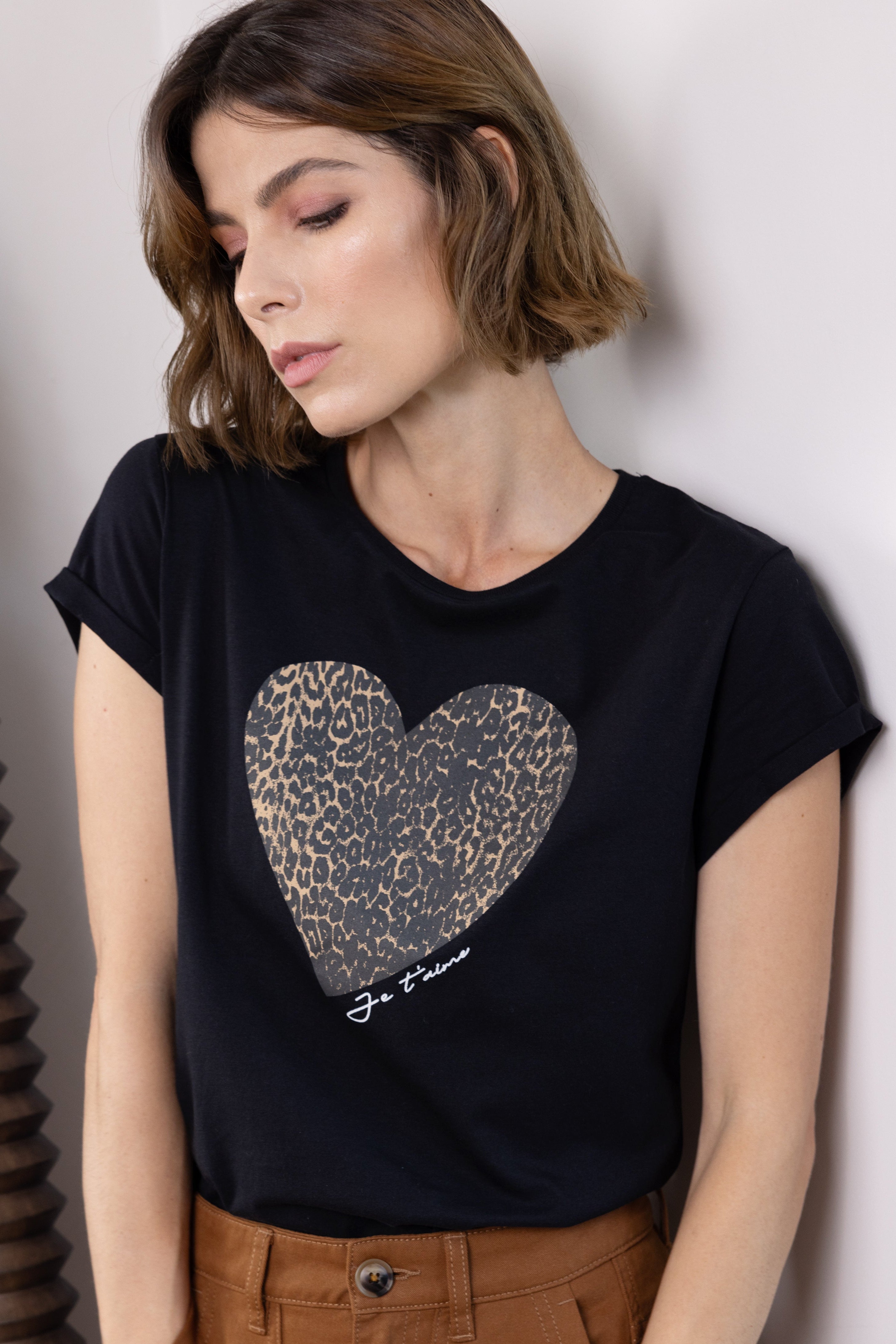 model wearing leopard heart neat fit t-shirt