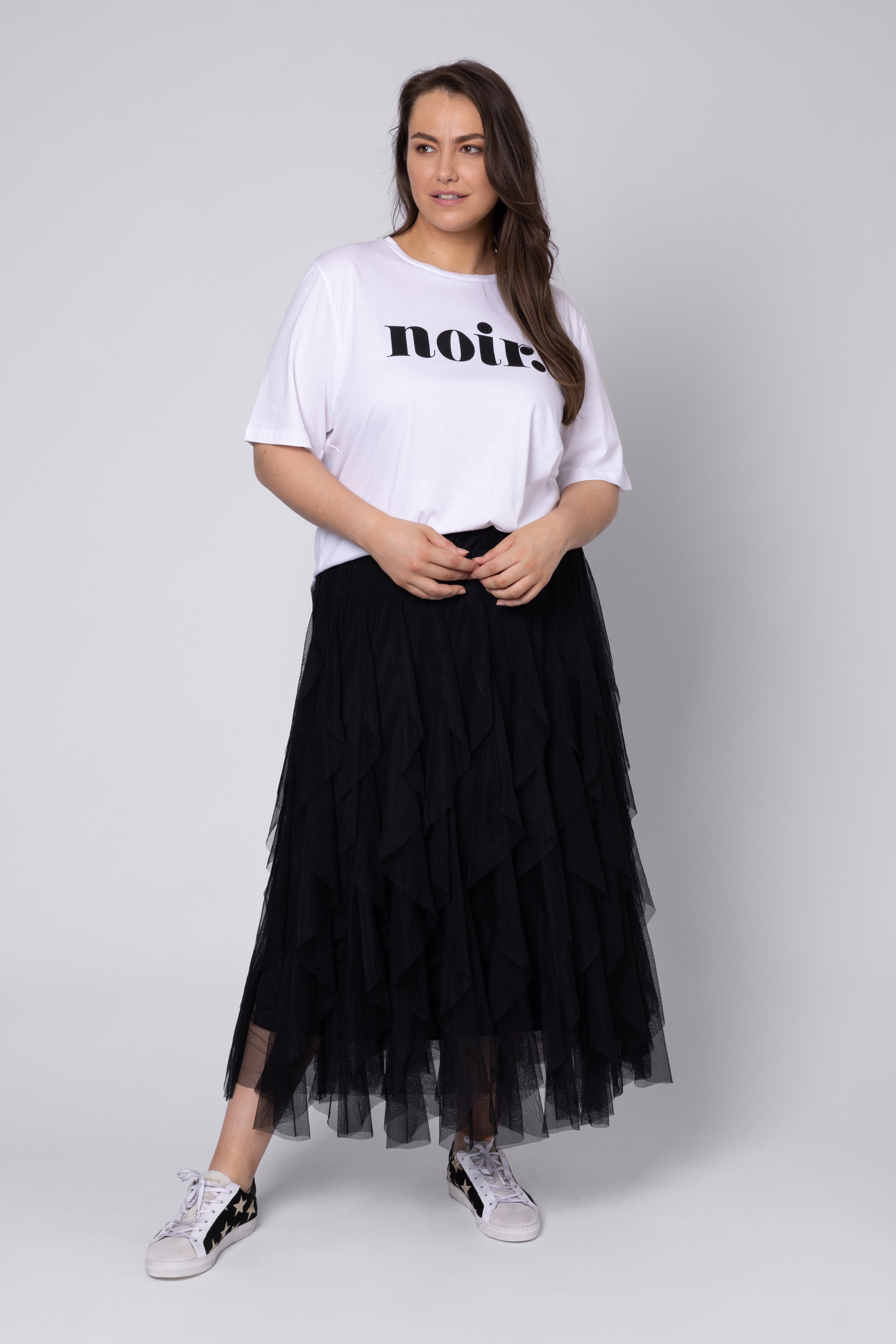 model wearing black tulle skirt with white Noir T Shirt Eleven Loves