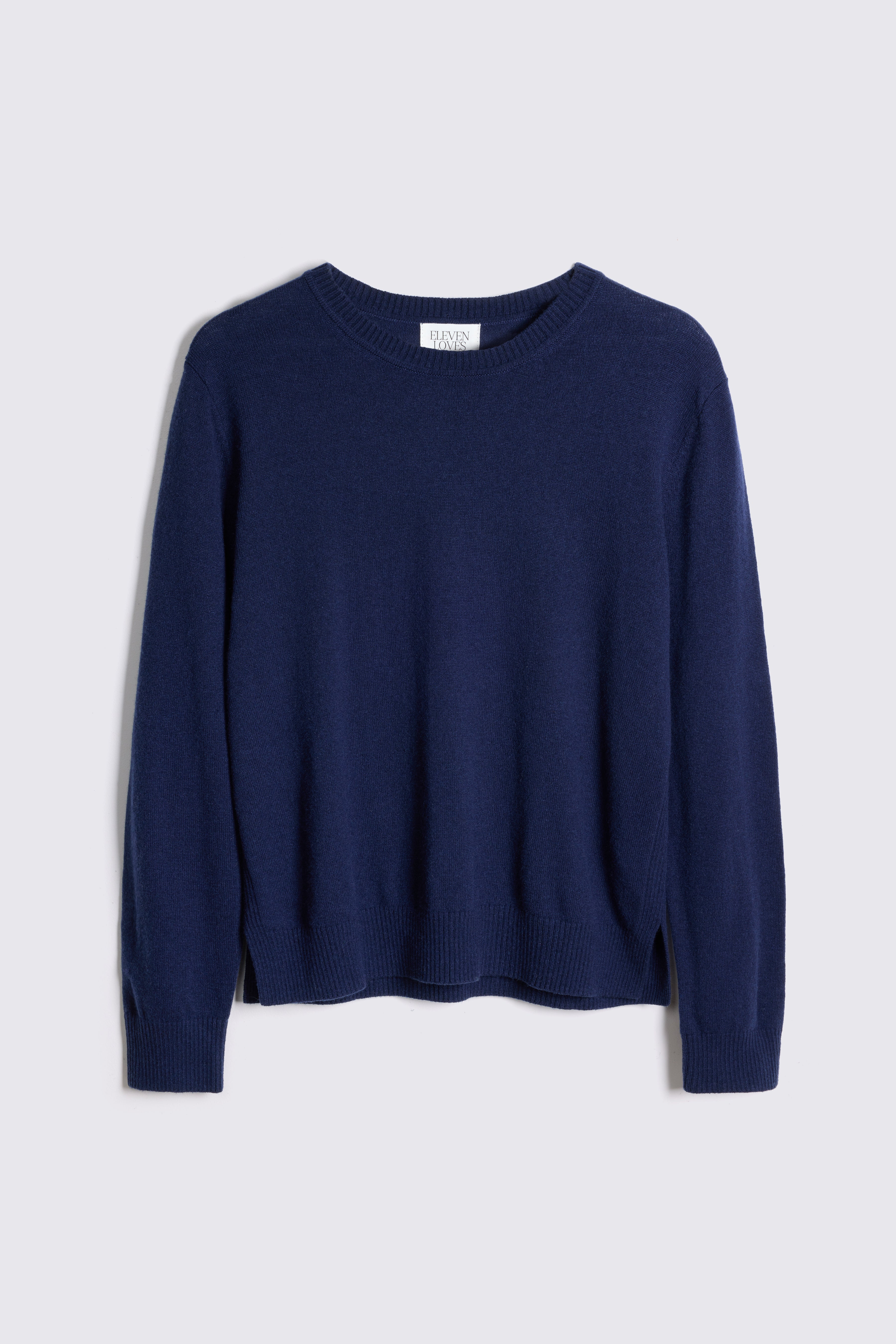 Navy blue sweater on a light gray background
