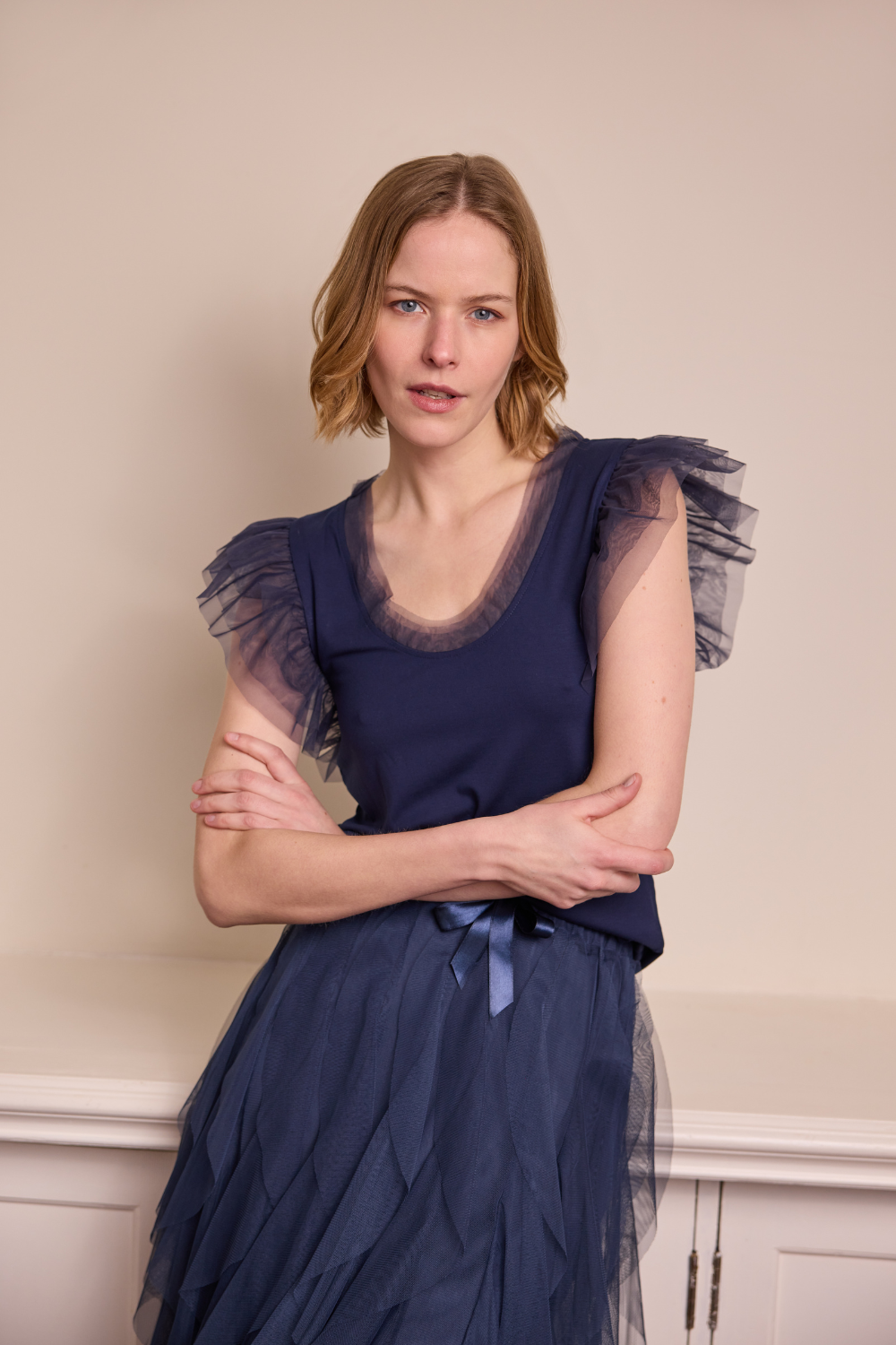 model wearing taylor tulle top navy