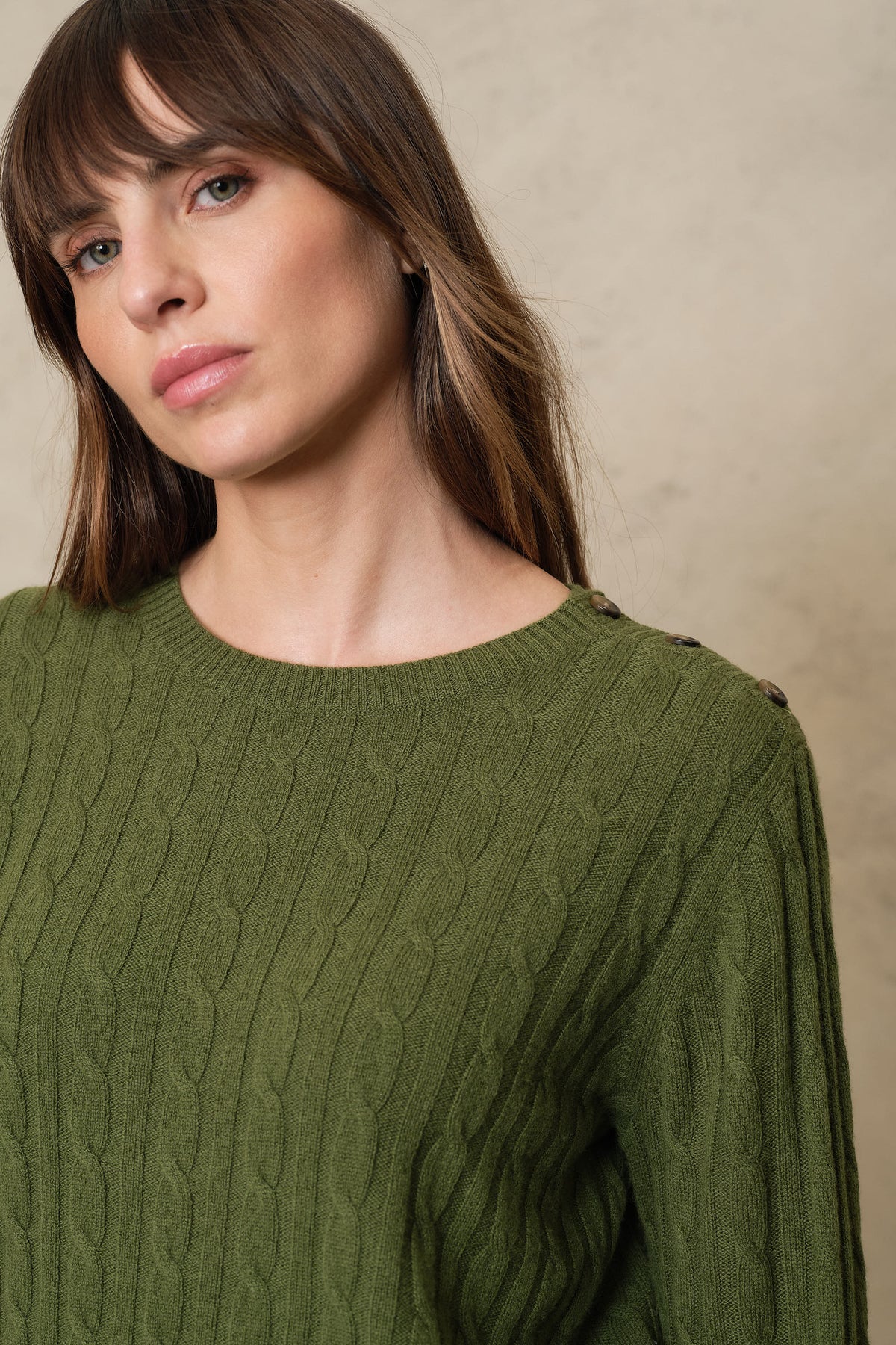 Light olive cable knit jumper in a wool and cashmere blend, crew neck