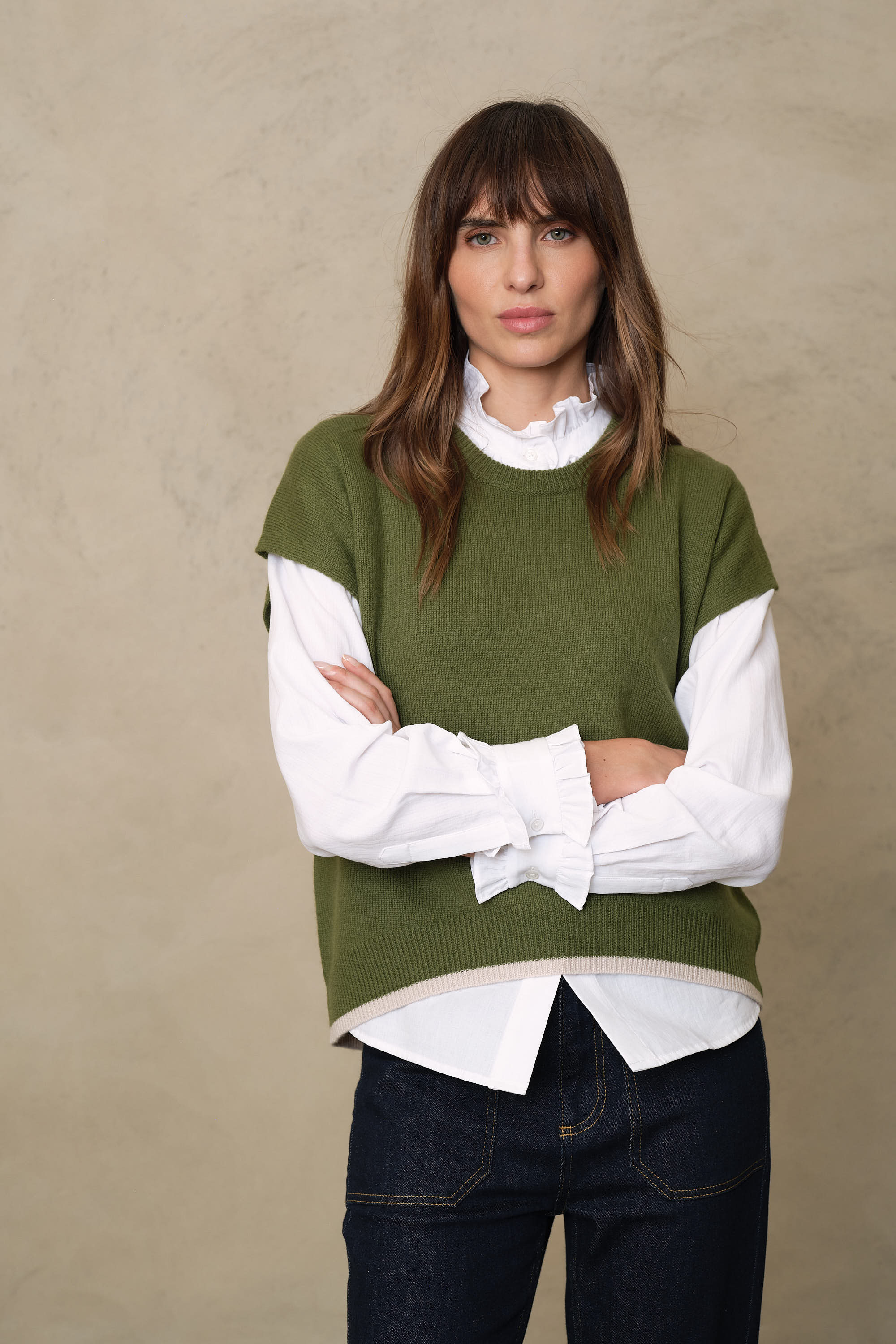 Ora light olive knitted vest in a 90% wool and 10% cashmere blend with deep ribbed trims