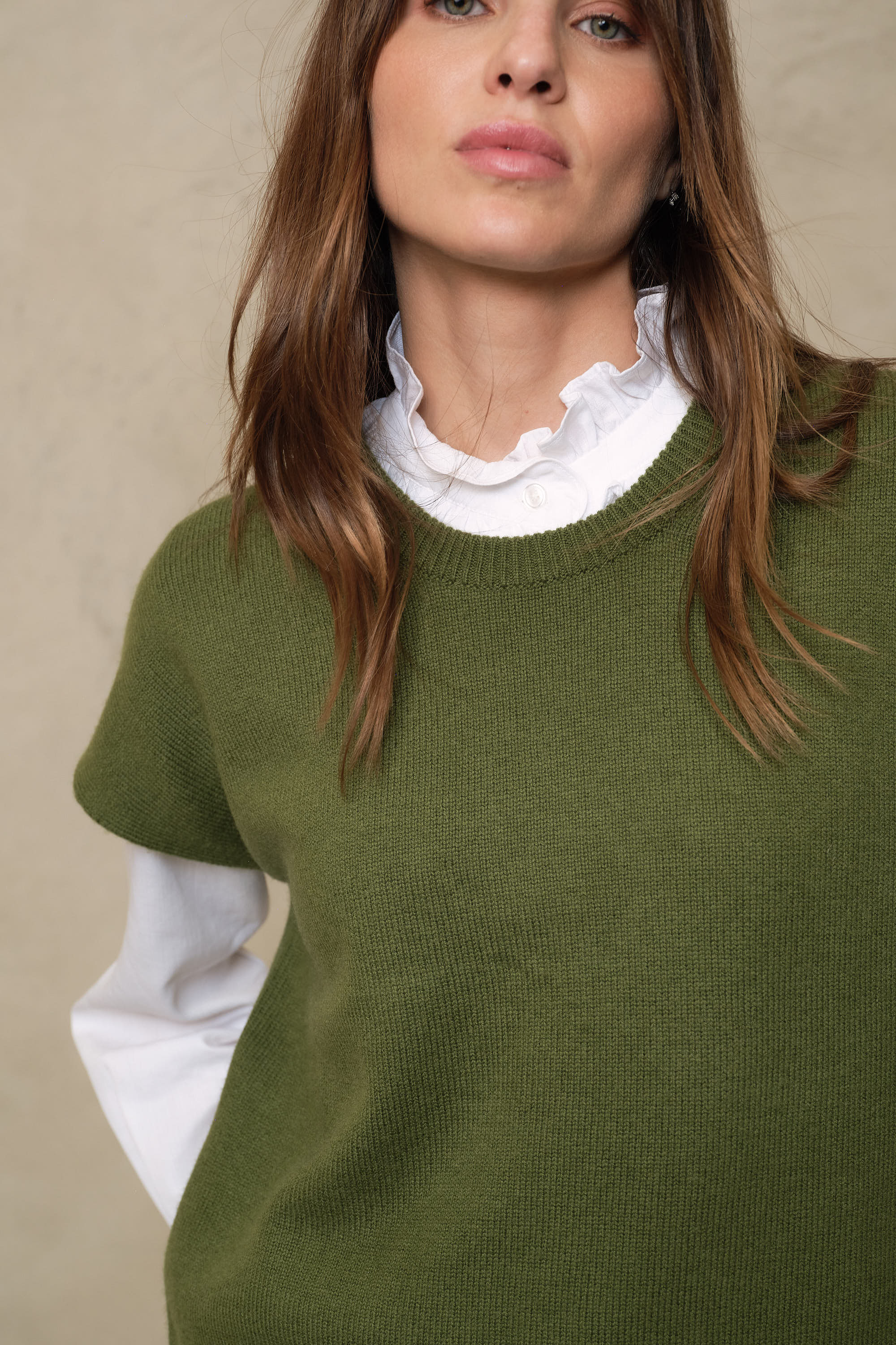 Ora light olive knitted vest, a relaxed boxy fit with a gently dropped back hem