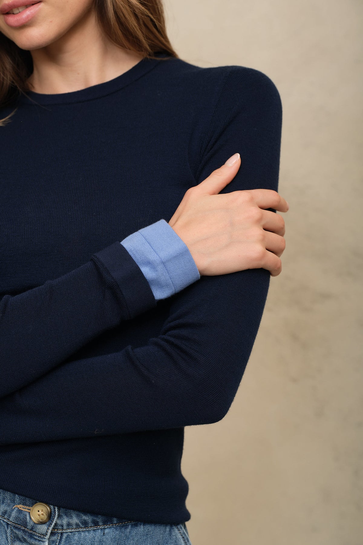 Trinny fine merino crewneck in navy with a sky blue sleeve