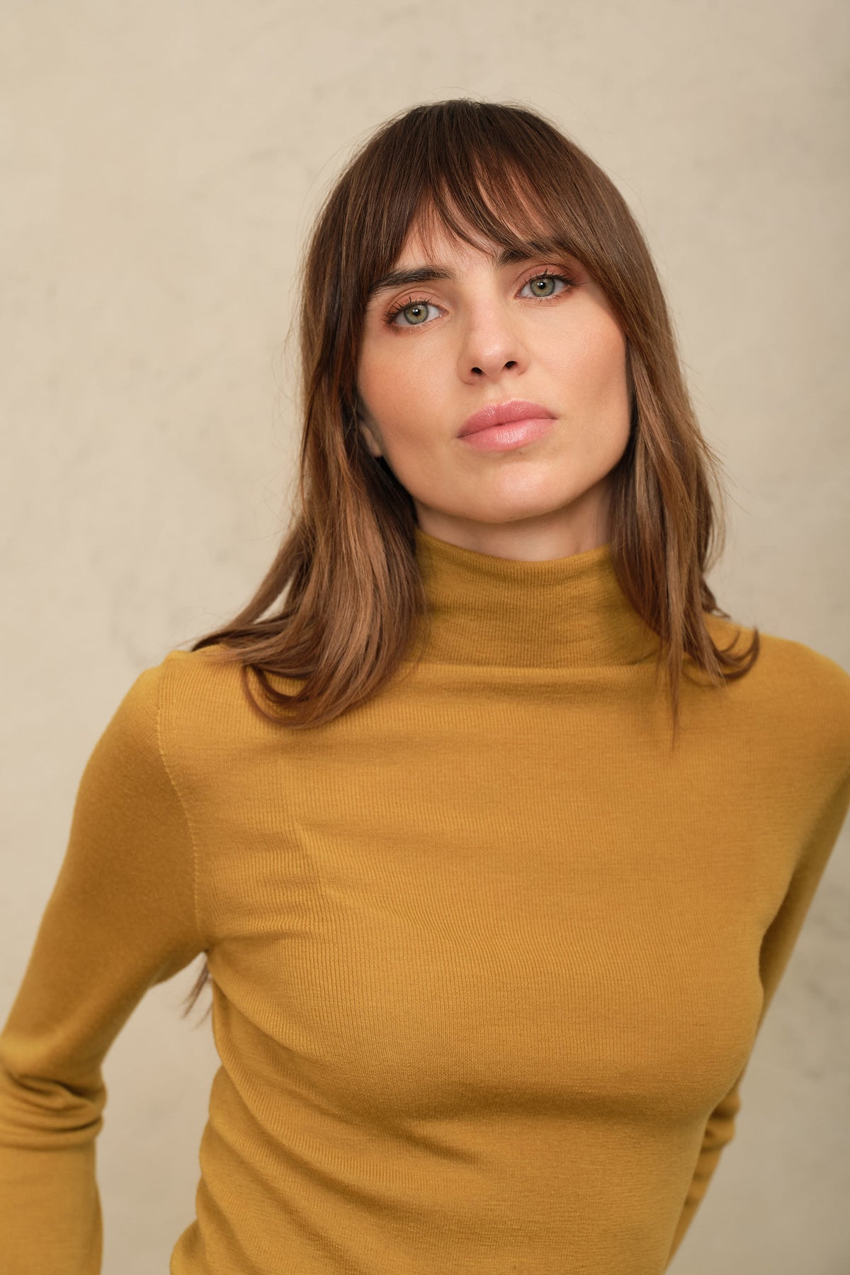 Gwyneth fine merino roll neck in mustard