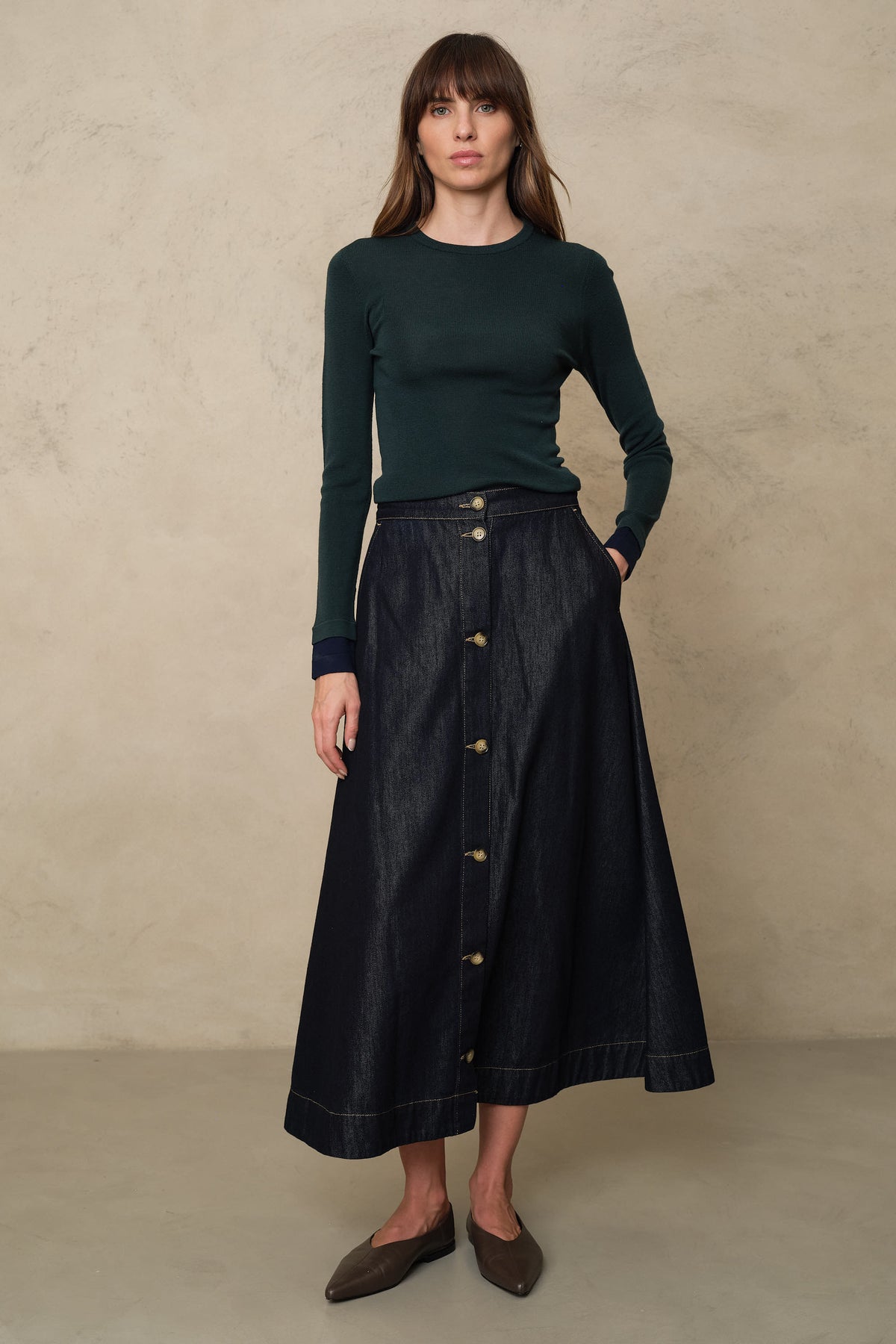 Trinny fine merino crewneck in bottle green with a navy sleeve