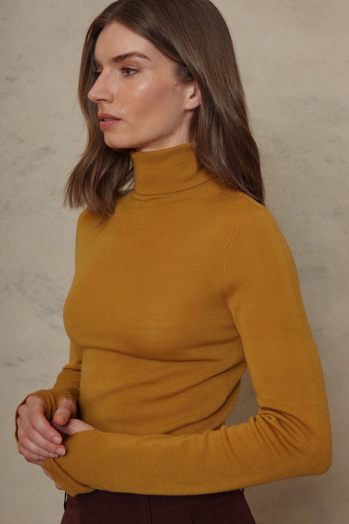 Gwyneth fine merino roll neck in mustard