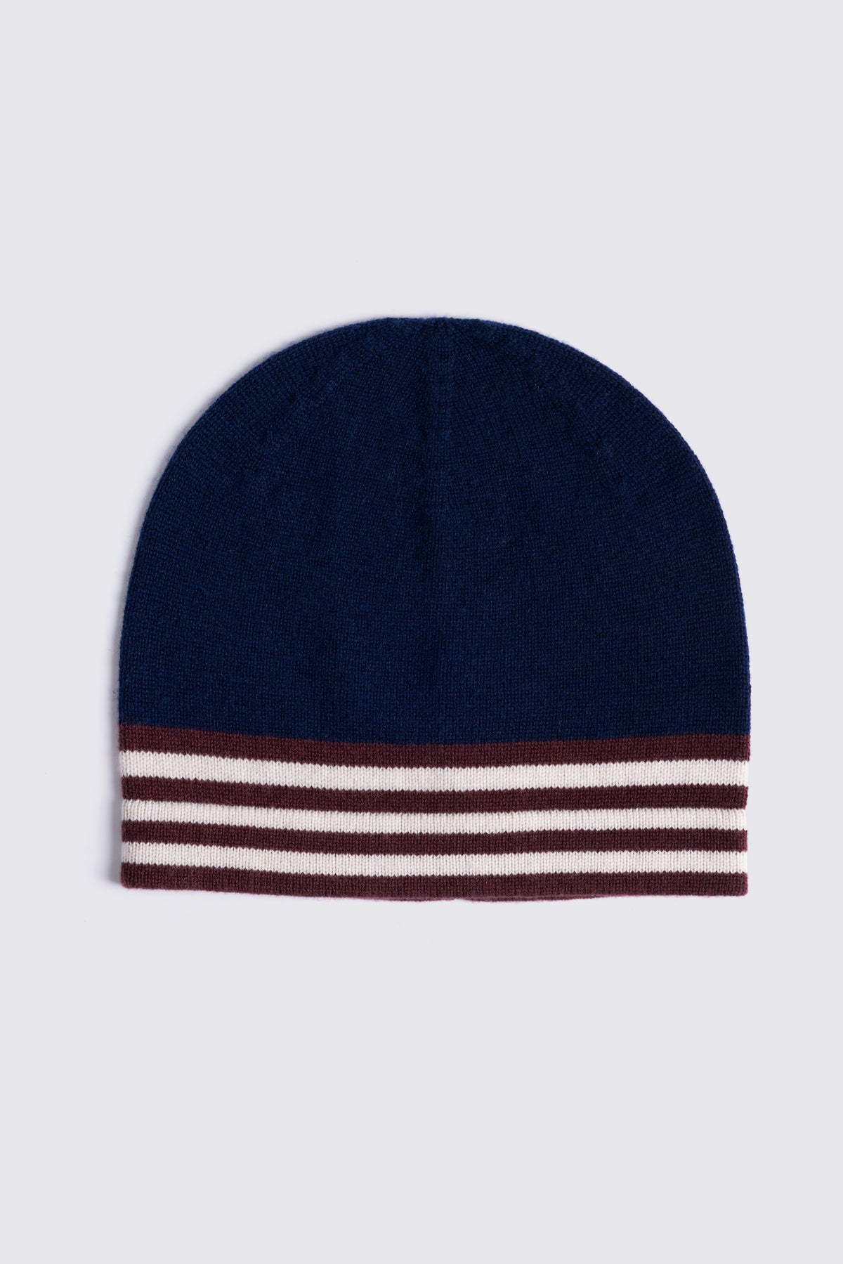 Zinnie cashmere blend beanie in navy laid flat, with burgundy and cream stripes at the cuff