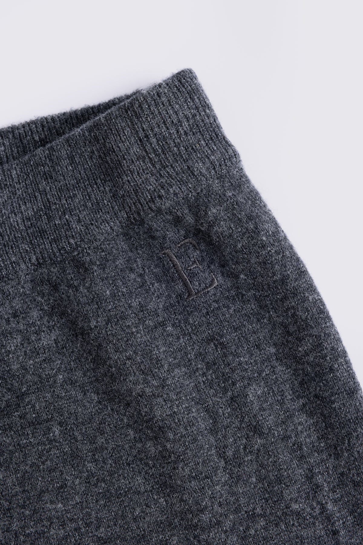 Charcoal knitted joggers in a wool and cashmere blend, shown flat
