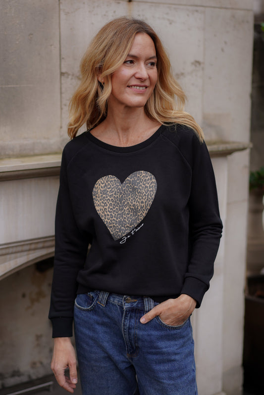 Model wearing Black Heart Sweatshirt Eleven Loves UK