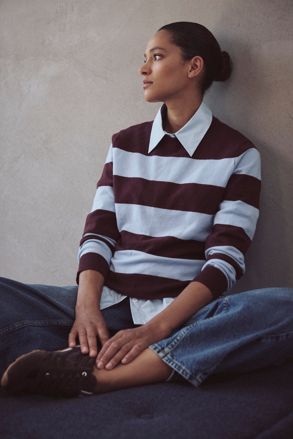 Camille striped jumper in sky blue and burgundy styled with jeans and brown loafers
