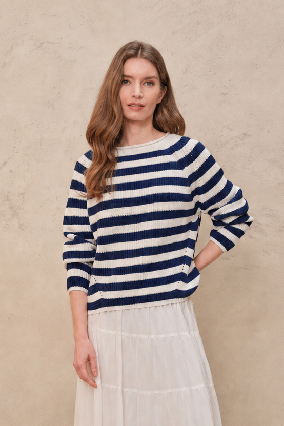 Polly navy striped pointelle jumper worn with a white tiered skirt