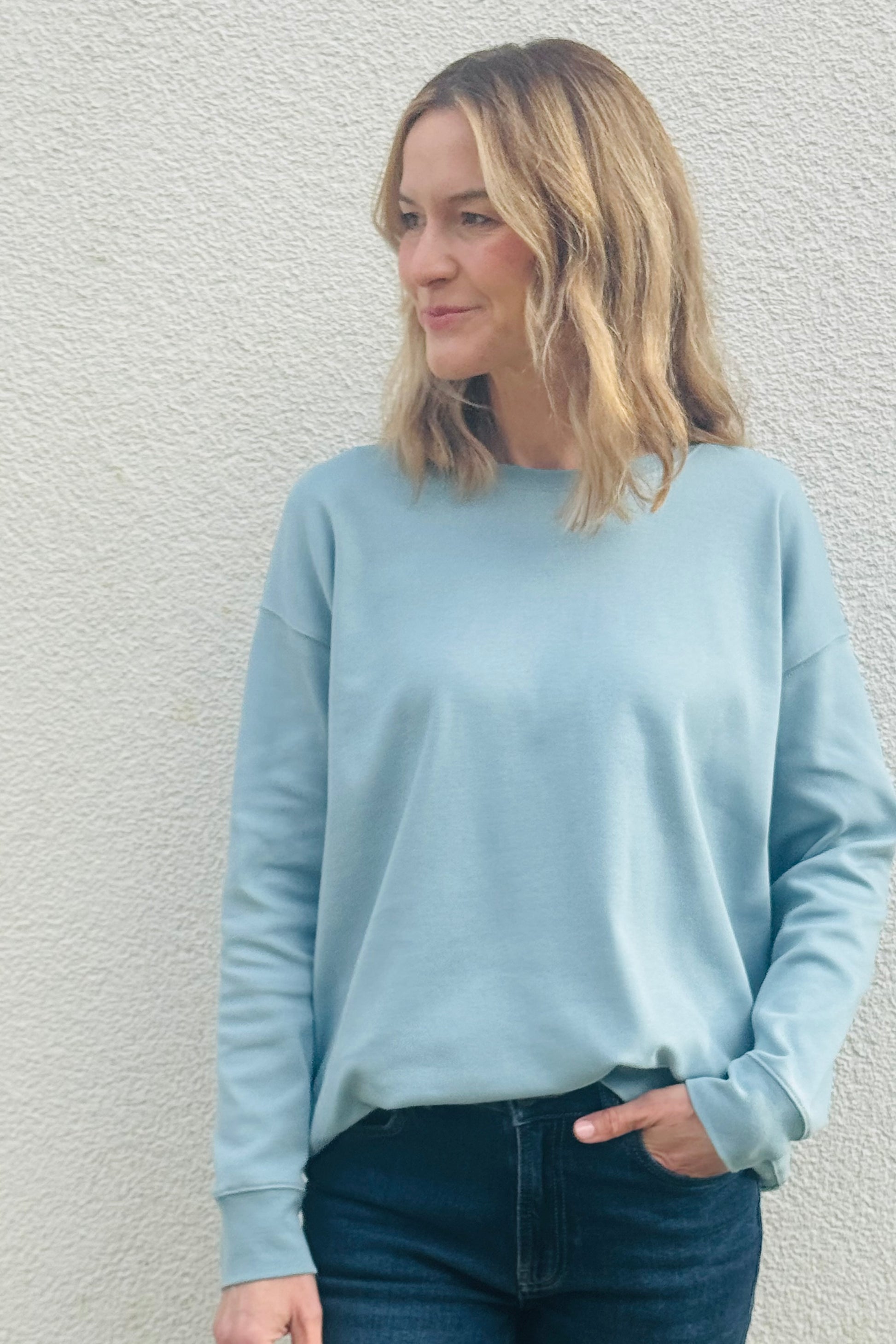 model wearing Crewneck Sweatshirt Light Blue Eleven Loves