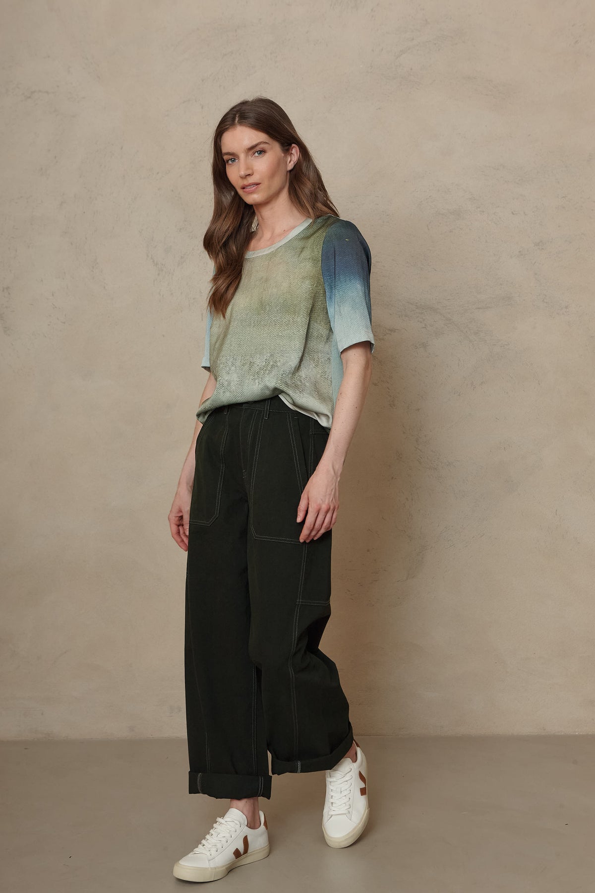 Billie barrel leg trousers in forest green worn with the Faye art print satin T Shirt