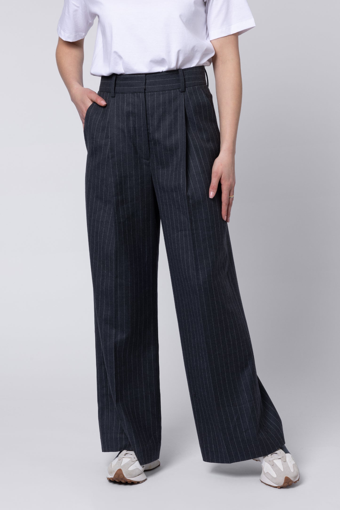 model wearing Grey Pinstripe Trousers Womens Eleven Loves