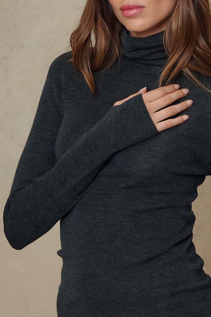 Gwyneth charcoal fine merino roll neck sleeve and knit detail, close up