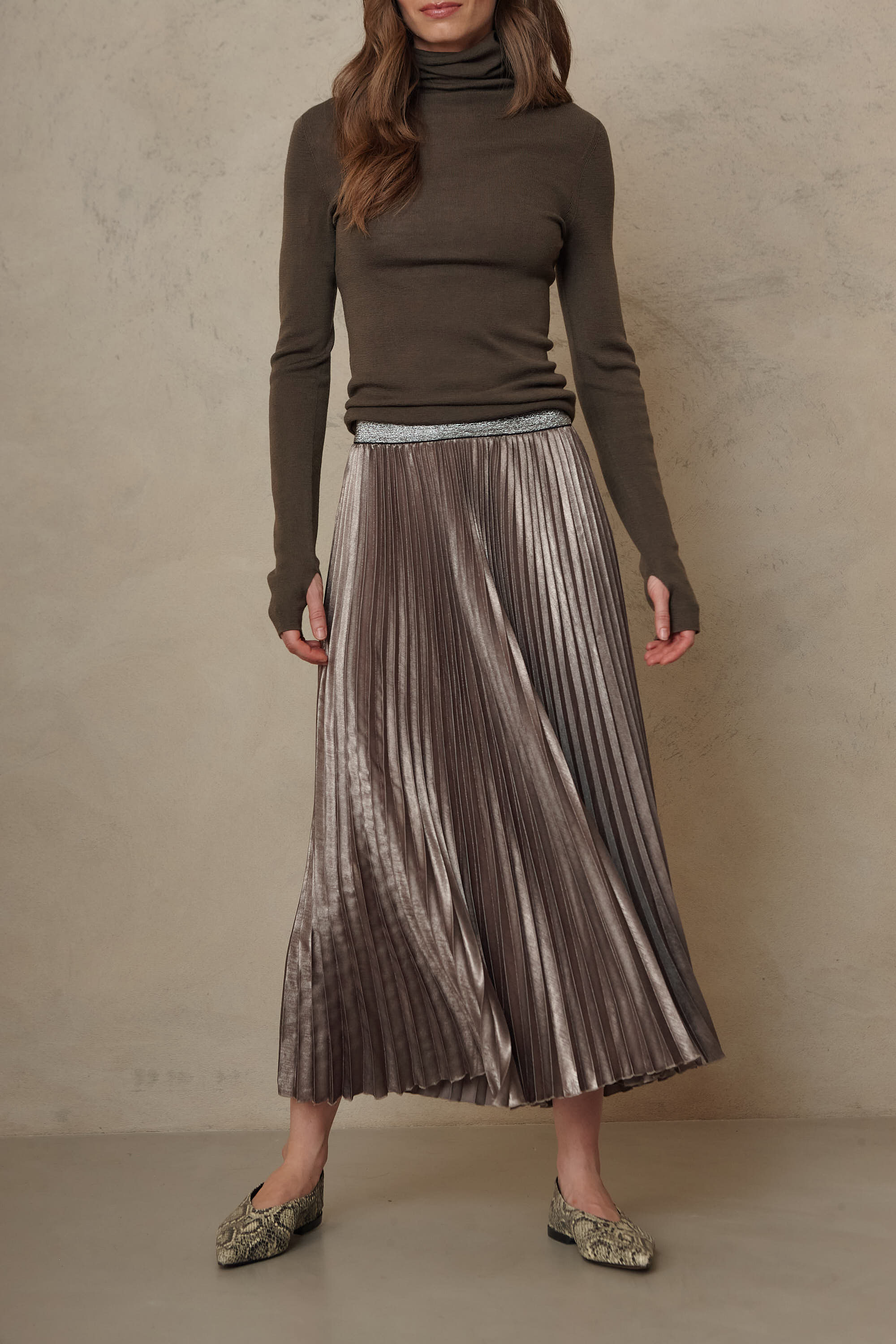 Mia pleated skirt in taupe worn with the Gwyneth fine merino roll neck in dark olive