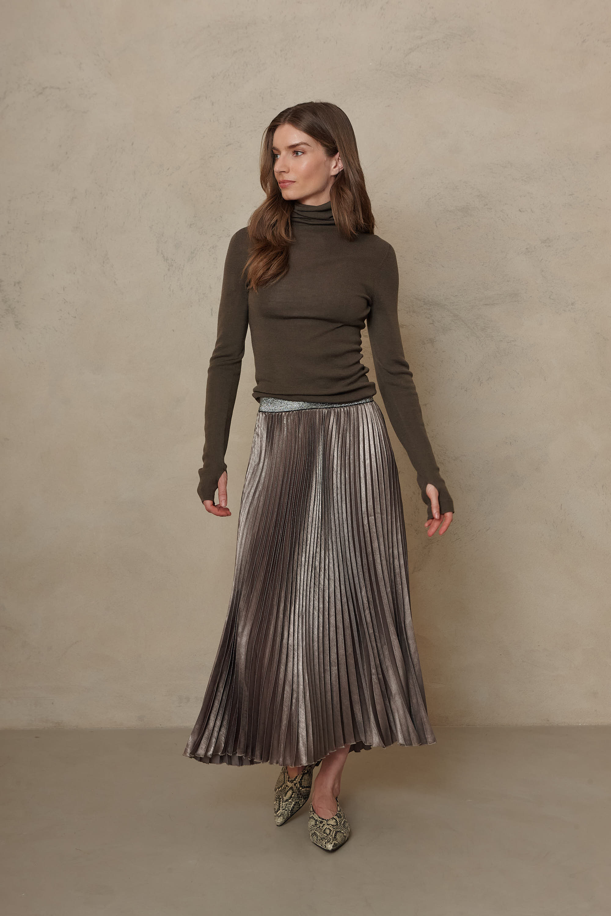 Mia pleated skirt in taupe worn with the Gwyneth fine merino roll neck in dark olive
