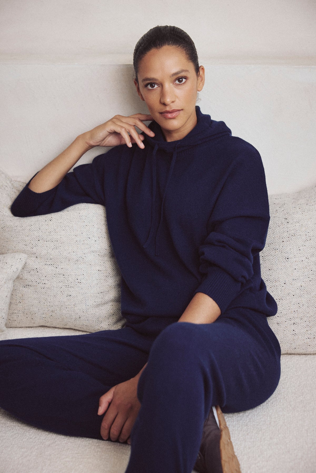 Antonia cashmere blend joggers in navy worn with the Heidi cashmere blend hoodie in navy