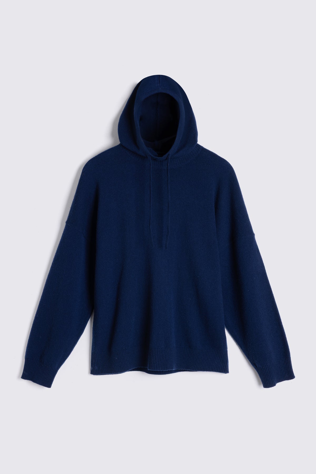 Heidi navy cashmere blend hoodie worn as a crew neck with the hood removed