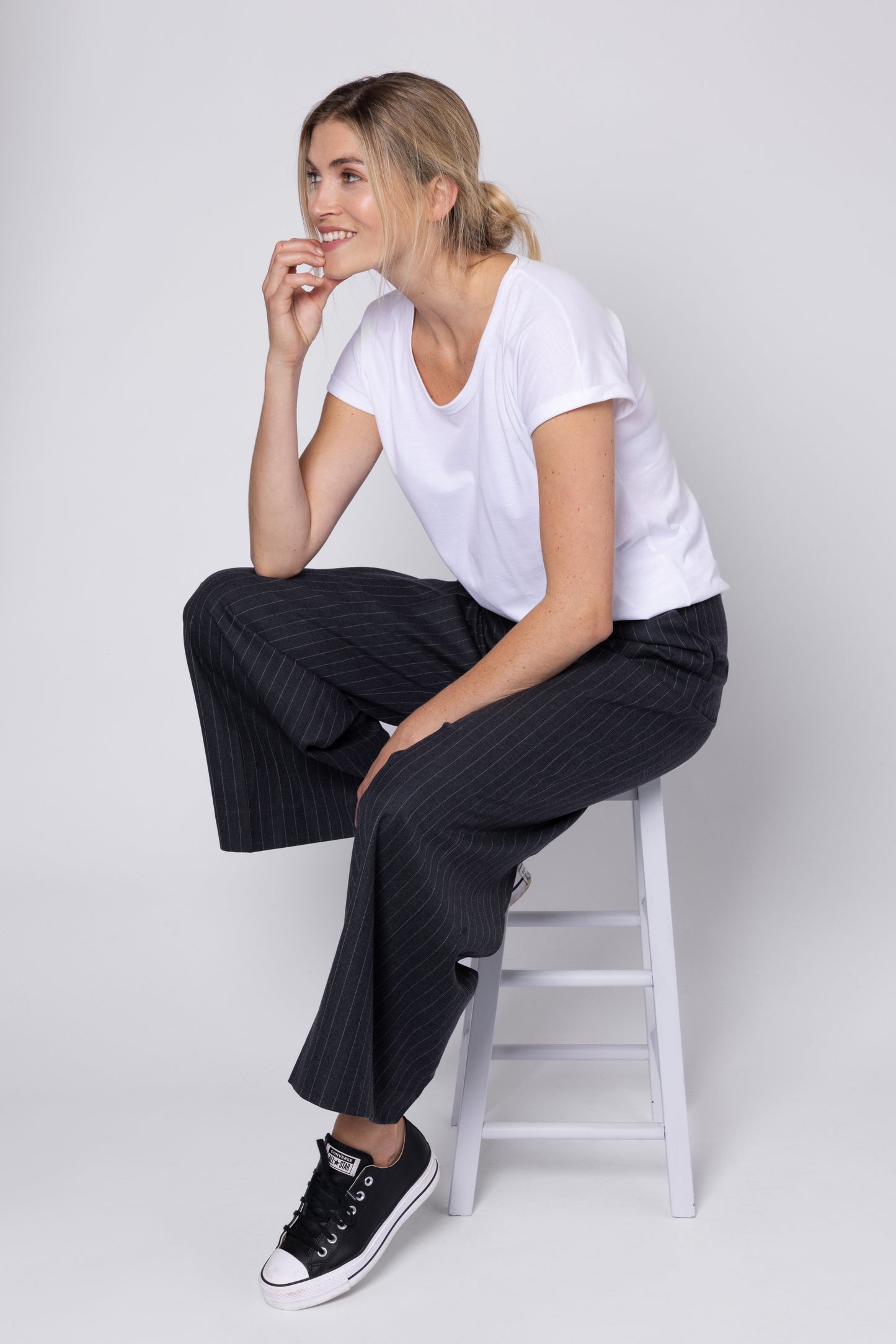 Model wearing Ladies Grey Pinstripe Trousers Elevenloves.co.uk