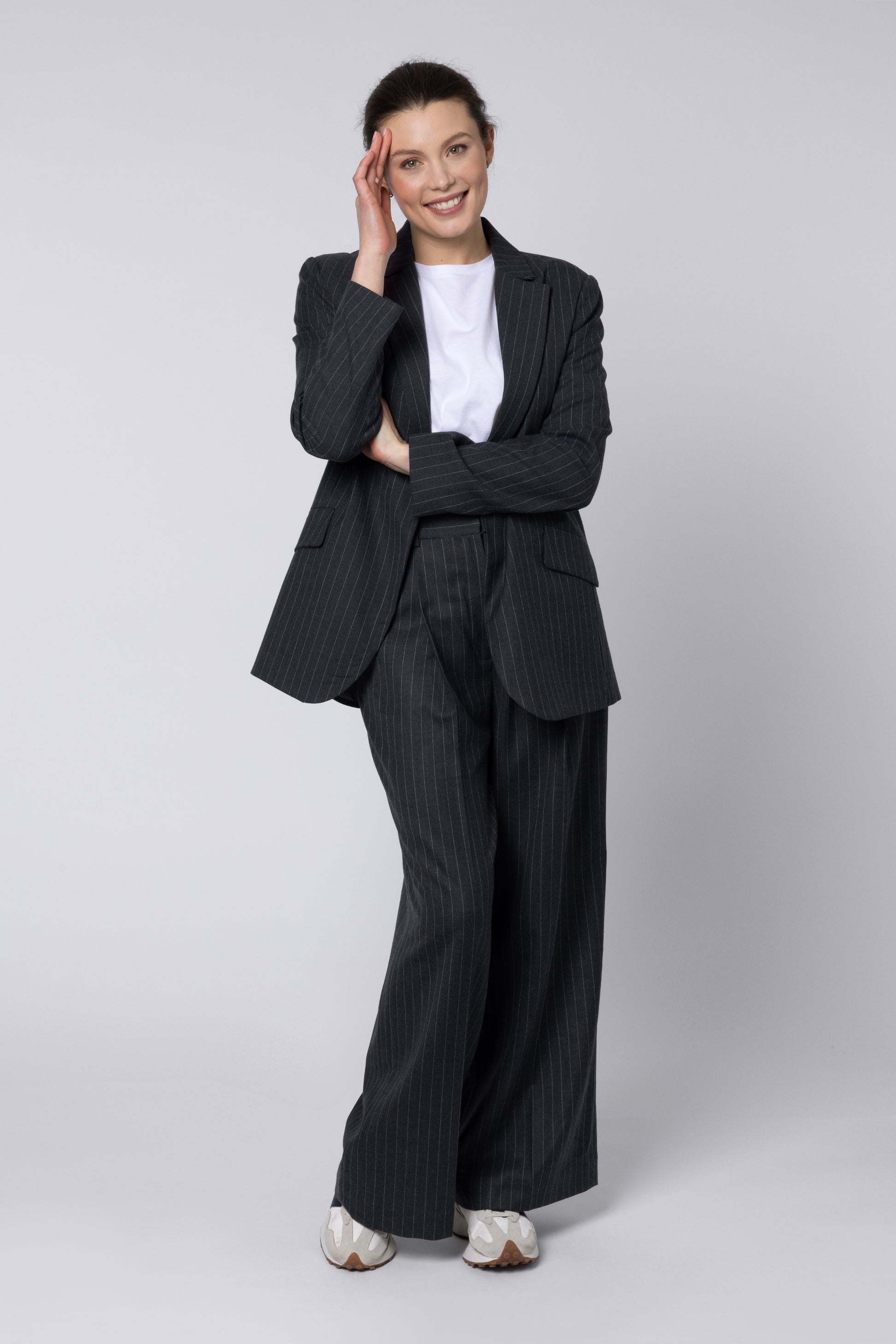 model wearing Pinstripe Suit Trousers Womens 11 Loves