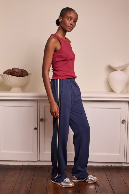 model wearing Saffron Side Stripe Trousers Navy Eleven Loves