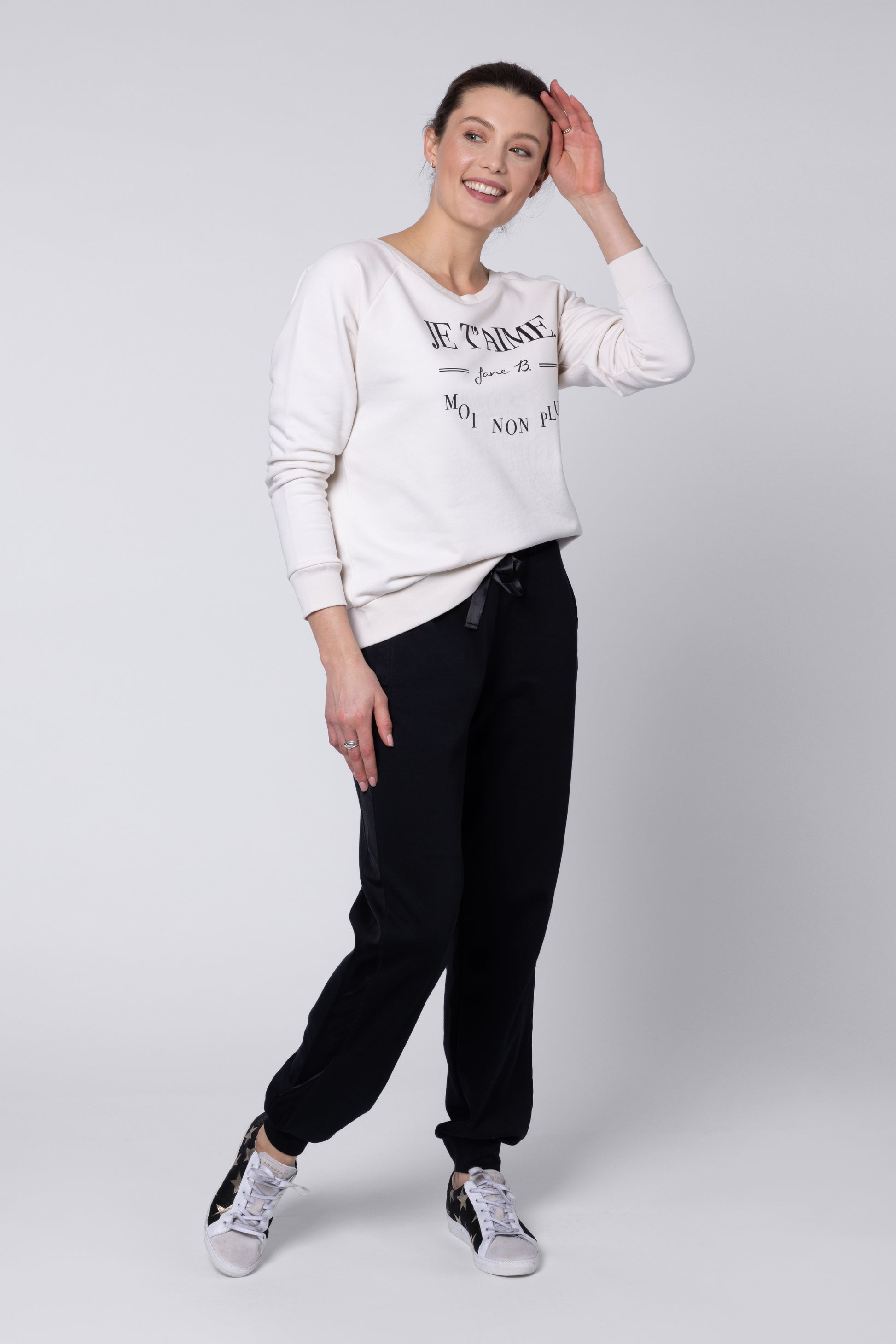 model wearing Side Stripe Joggers Womens with sweatshirt Eleven Loves UK 