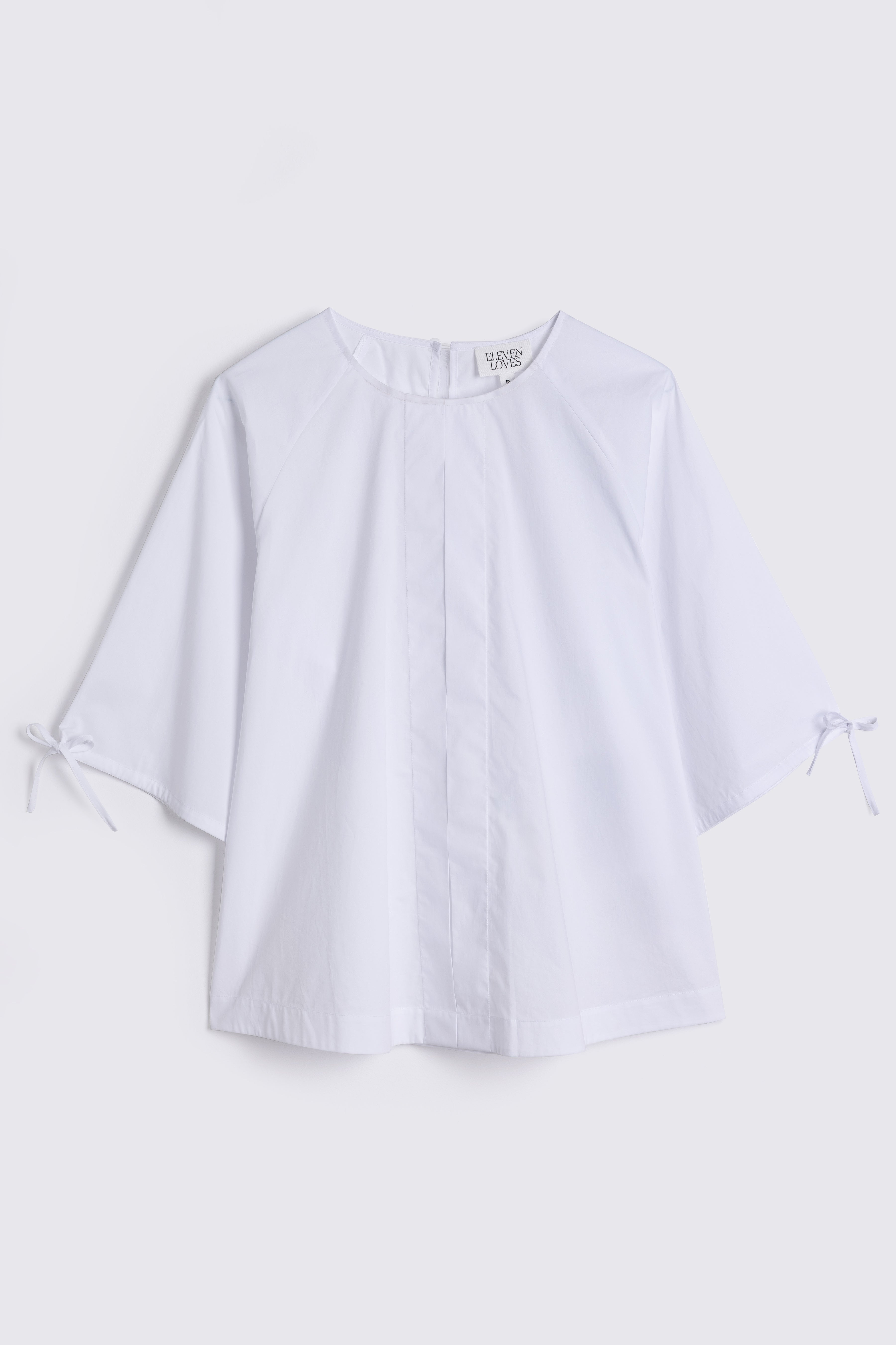 white tie sleeve cotton blouse on white background
