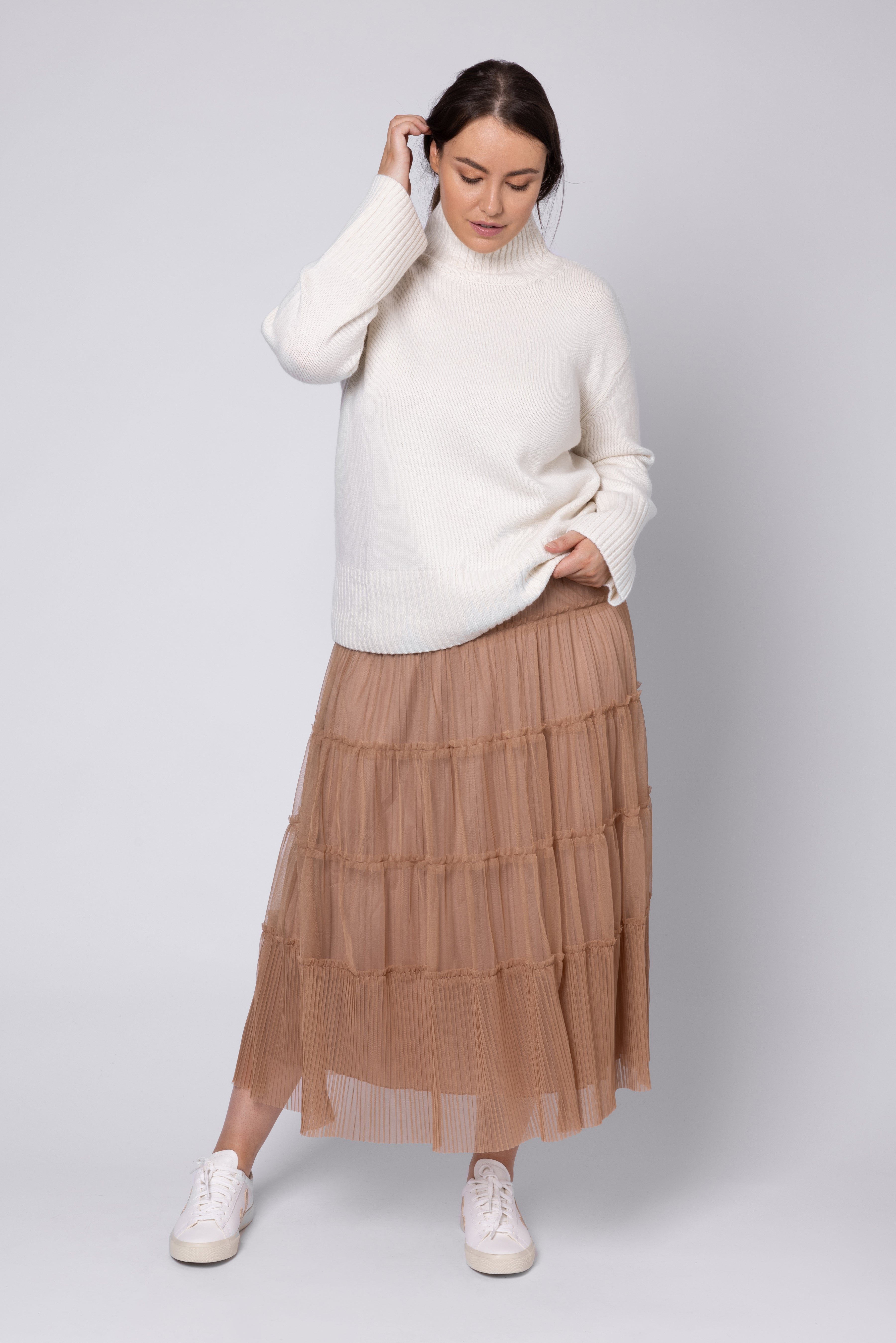 model wearing ivory funnel jumper Eleven Loves